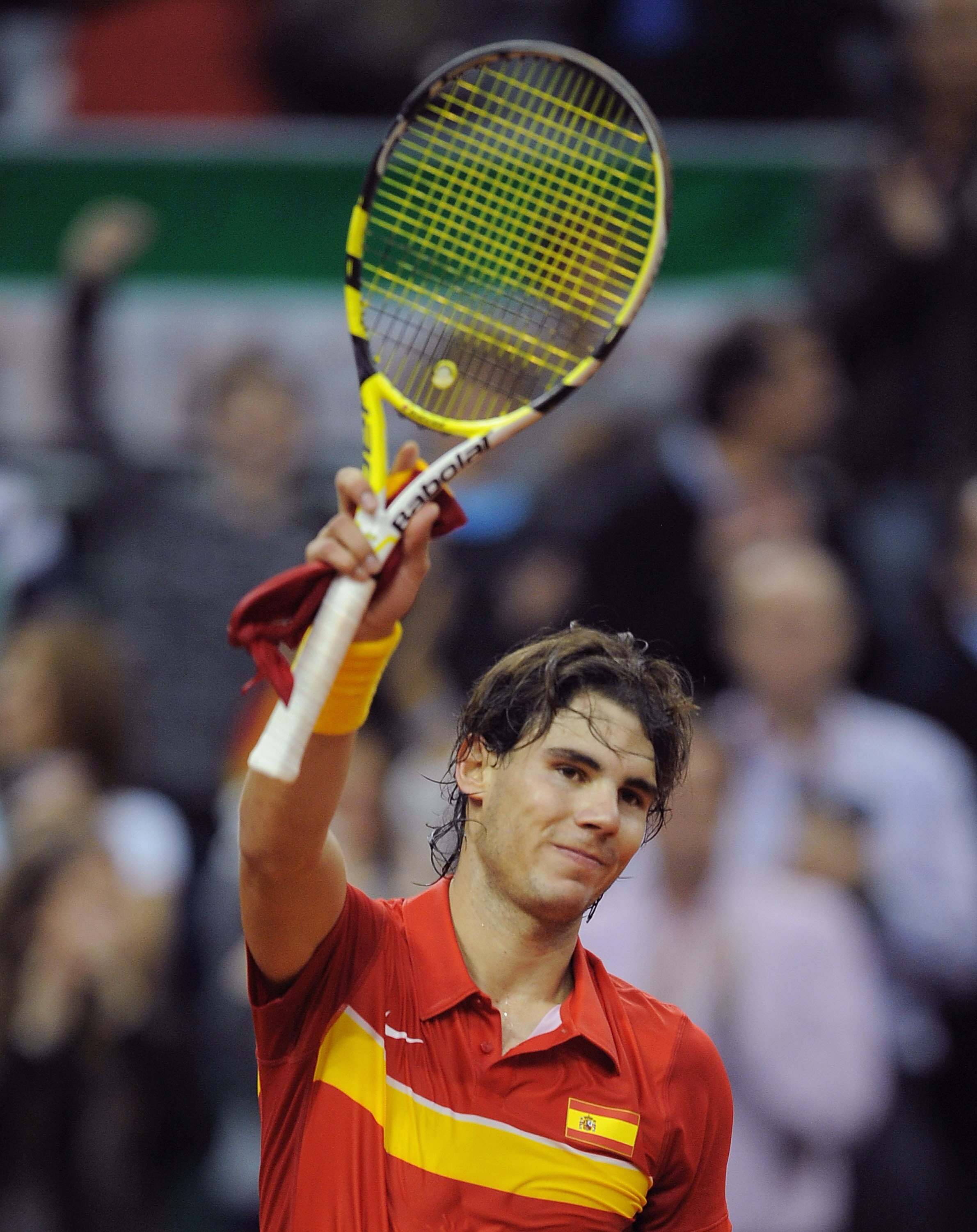 BARCELONA, SPAIN - DECEMBER 06:  Rafael Nadal of Spain salutes the crowd after beating Jan Hajek of Czech Republic in the fourth match of the Davis Cup final  between Spain and Czech Republic at the Palau Sant Jordi stadium on December 6, 2009 in Barcelon