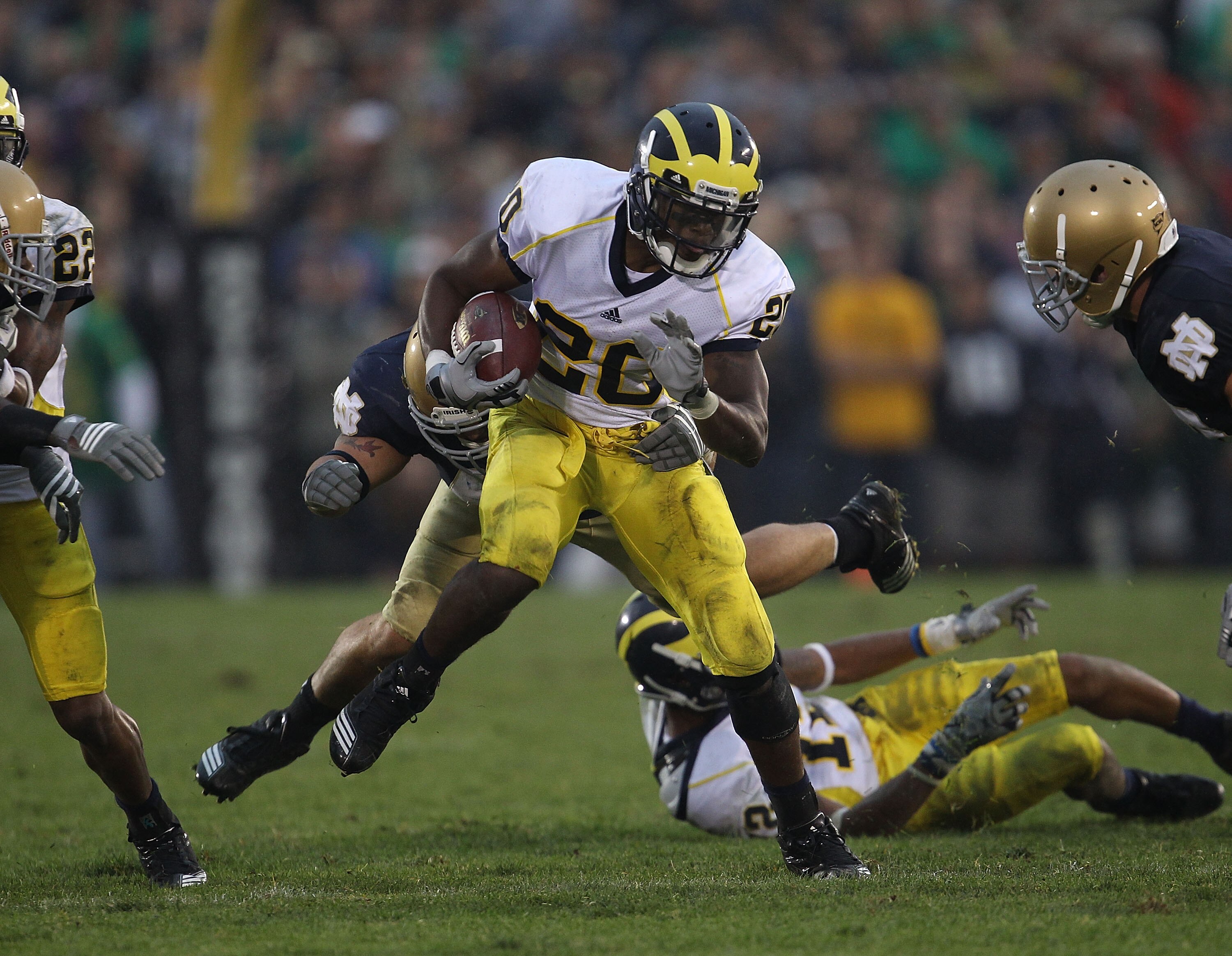 SOUTH BEND, IN - SEPTEMBER 11: Michael Shaw #20 of the Michigan Wolverines runs for yardage against the Notre Dame Fighting Irish at Notre Dame Stadium on September 11, 2010 in South Bend, Indiana. Michigan defeated Notre Dame 28-24. (Photo by Jonathan Da SOUTH BEND, IN - SEPTEMBER 11: Michael Shaw #20 of the Michigan Wolverines runs for yardage against the Notre Dame Fighting Irish at Notre Dame Stadium on September 11, 2010 in South Bend, Indiana. Michigan defeated Notre Dame 28-24. (Photo by Jonathan Da
