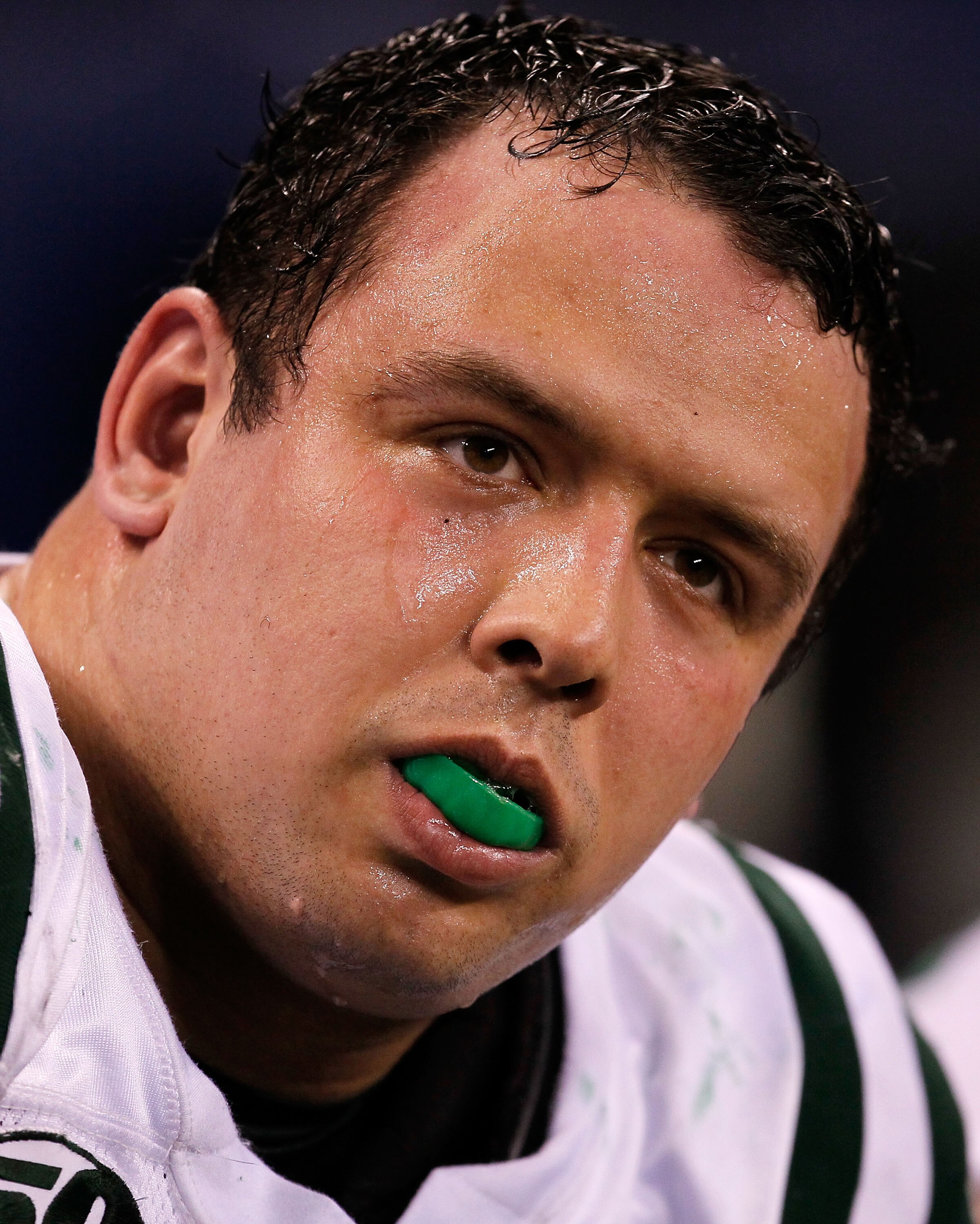INDIANAPOLIS - JANUARY 24:  Defensive end Mike Devito #70 of the New York Jets looks on from the sidelines during the fourth quarter of the game against the Indianapolis Colts during the AFC Championship Game at Lucas Oil Stadium on January 24, 2010 in In