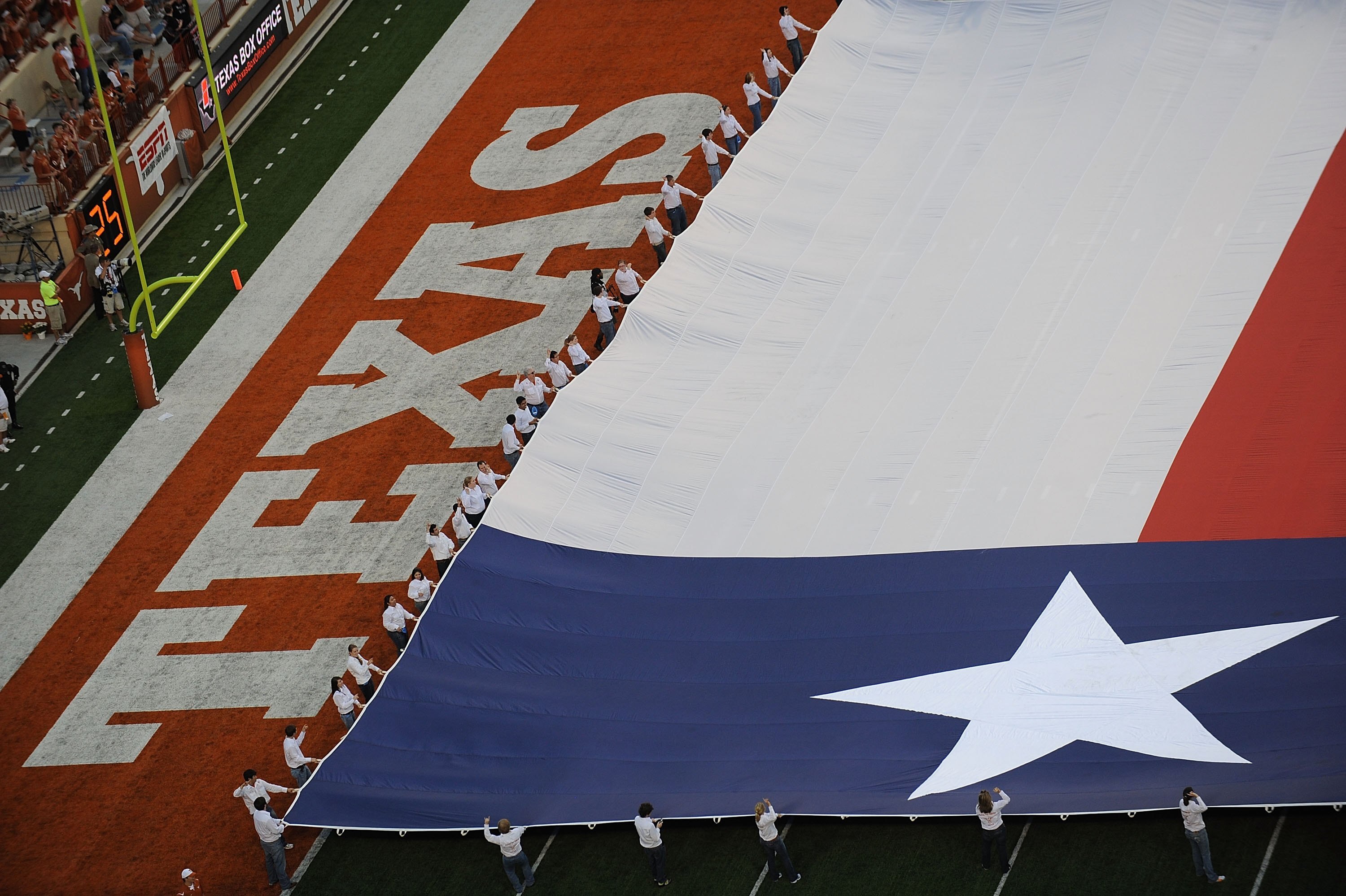 AUSTIN, TX - SEPTEMBER 19:  A Texas flag before a game between the Texas Tech Red Raiders and the Texas Longhorns at Darrell K Royal-Texas Memorial Stadium on September 19, 2009 in Austin, Texas.  (Photo by Ronald Martinez/Getty Images)