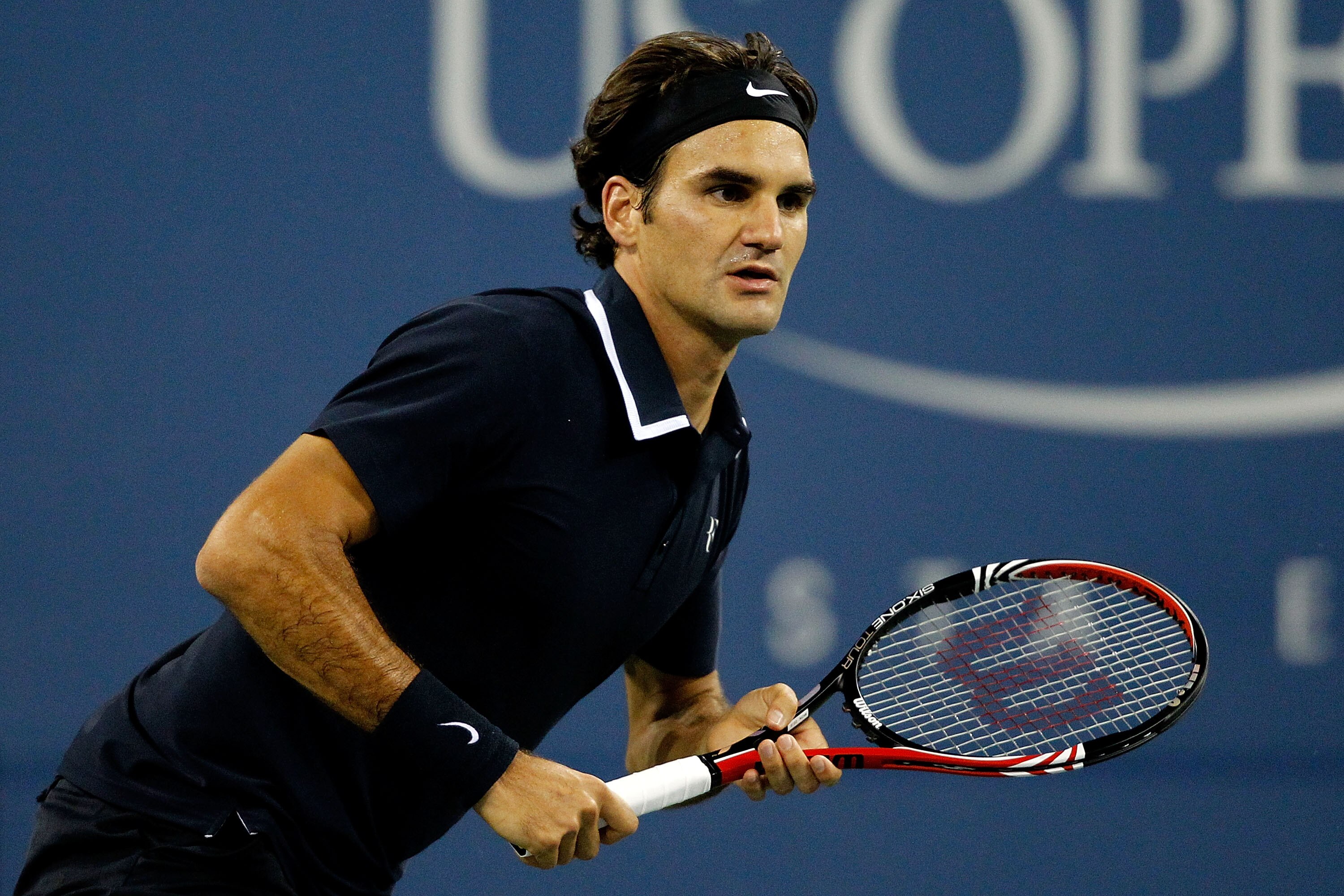 NEW YORK - SEPTEMBER 06:  Roger Federer of Switzerland plays against Jurgen Melzer of Austria during day eight of the 2010 U.S. Open at the USTA Billie Jean King National Tennis Center on September 6, 2010 in the Flushing neighborhood of the Queens boroug