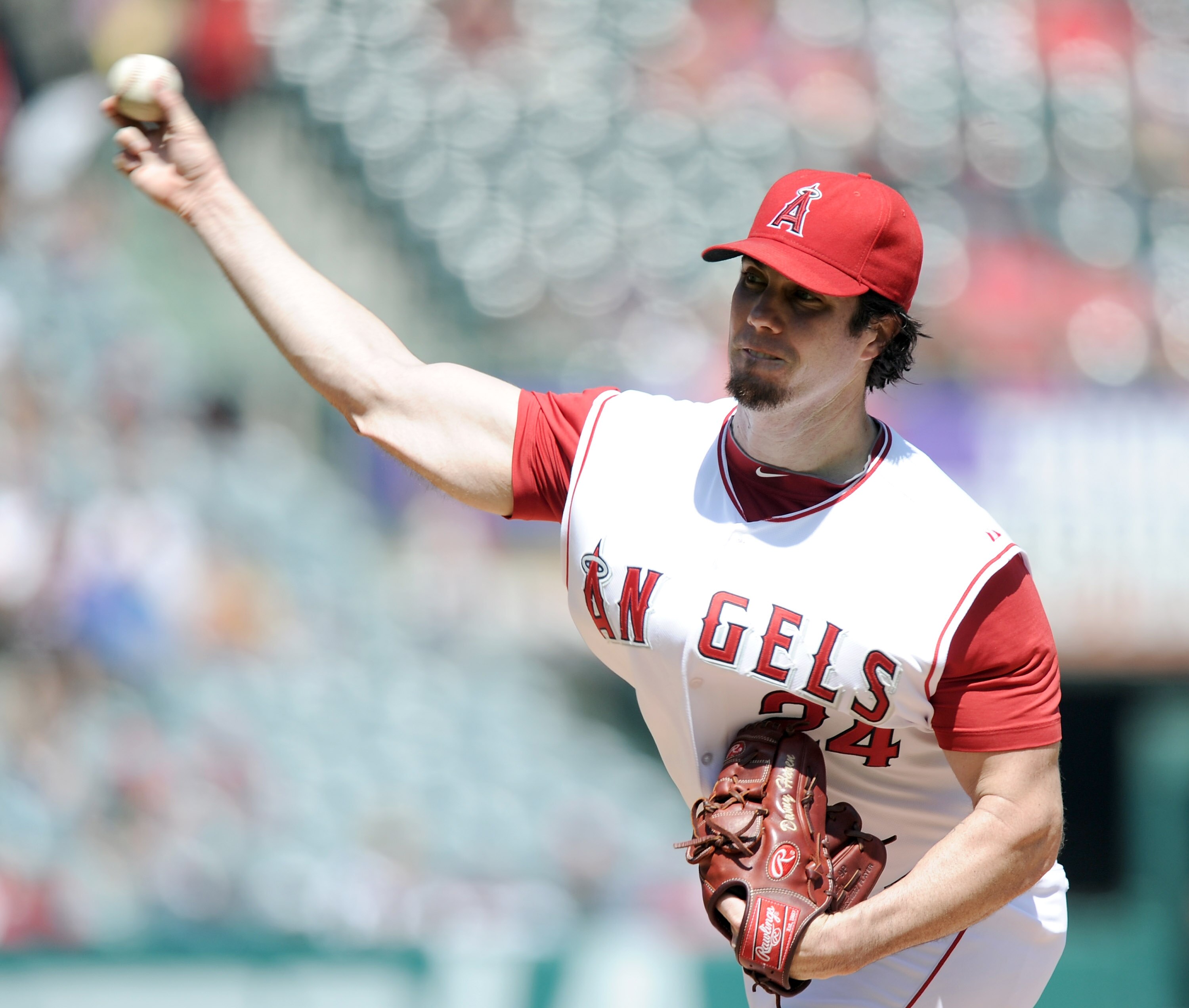 ANAHEIM, CA - SEPTEMBER 12:  Dan Haren #24 of the Los Angeles Angels of Anaheim pitches against the Seattle Mariners during the second inning at Angel Stadium on September 12, 2010 in Anaheim, California.  (Photo by Harry How/Getty Images)