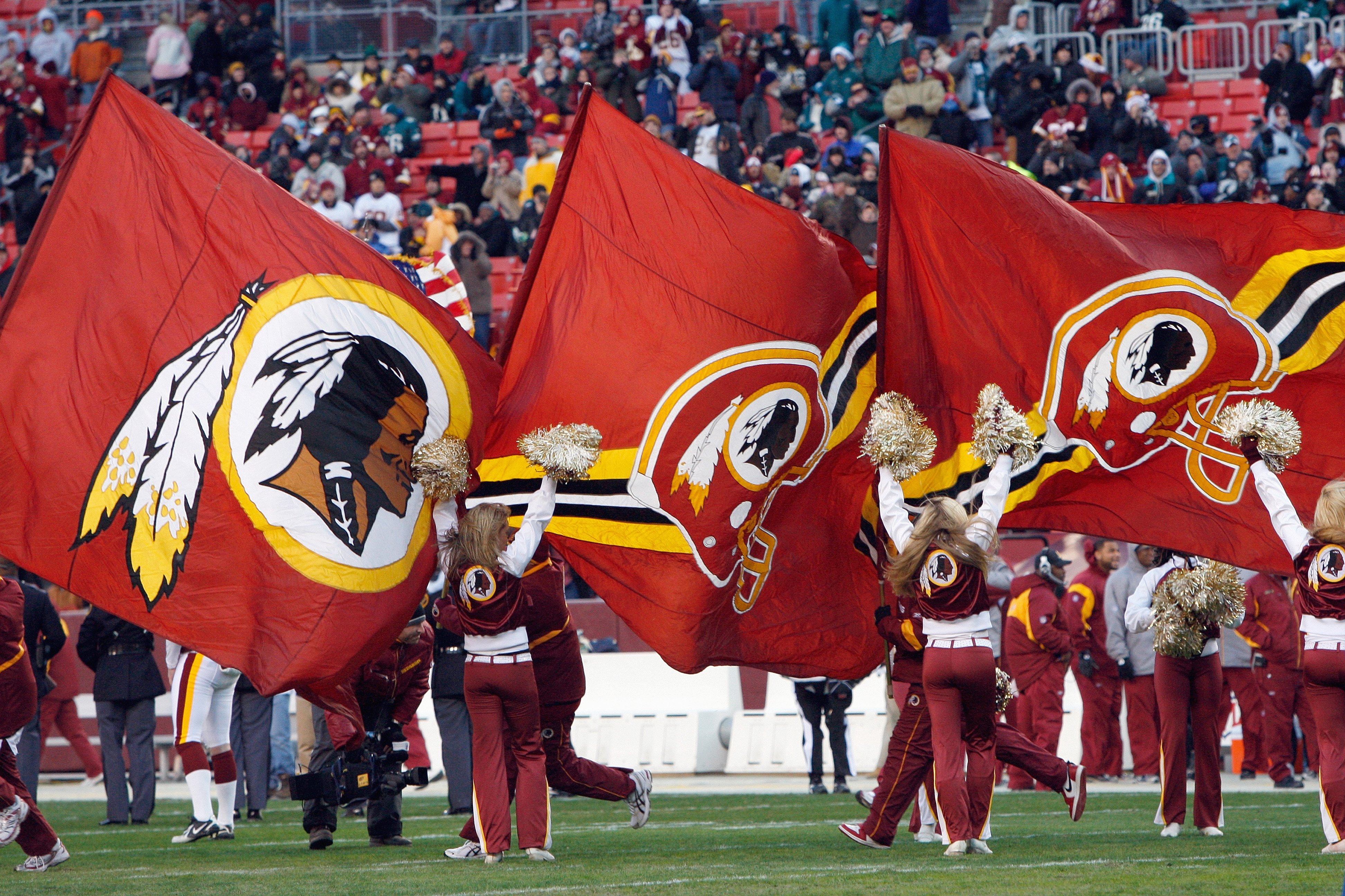 LANDOVER, MD - DECEMBER 21:  A general view of the Washington Redskins cheer squad as the fly flags during the game of the Philadelphia Eagles on December 21, 2008 at FedEx Field in Landover, Maryland.  (Photo by Kevin C. Cox/Getty Images)