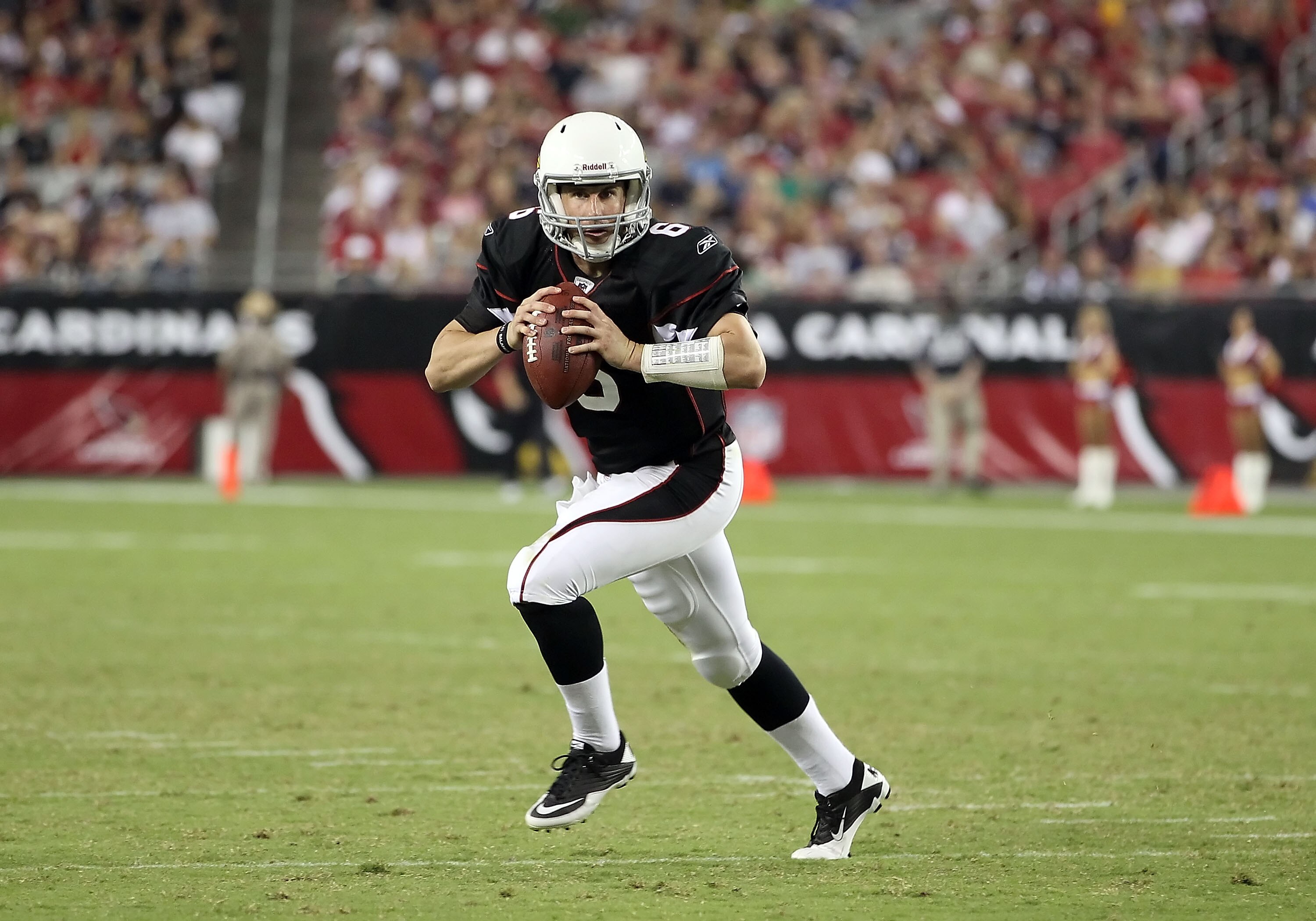 GLENDALE, AZ - SEPTEMBER 02:  Quarterback Max Hall #6 of the Arizona Cardinals scrambles for a 6 yard touchdown against the Washington Redskins during the third quarter of the preseason NFL game at the University of Phoenix Stadium on September 2, 2010 in