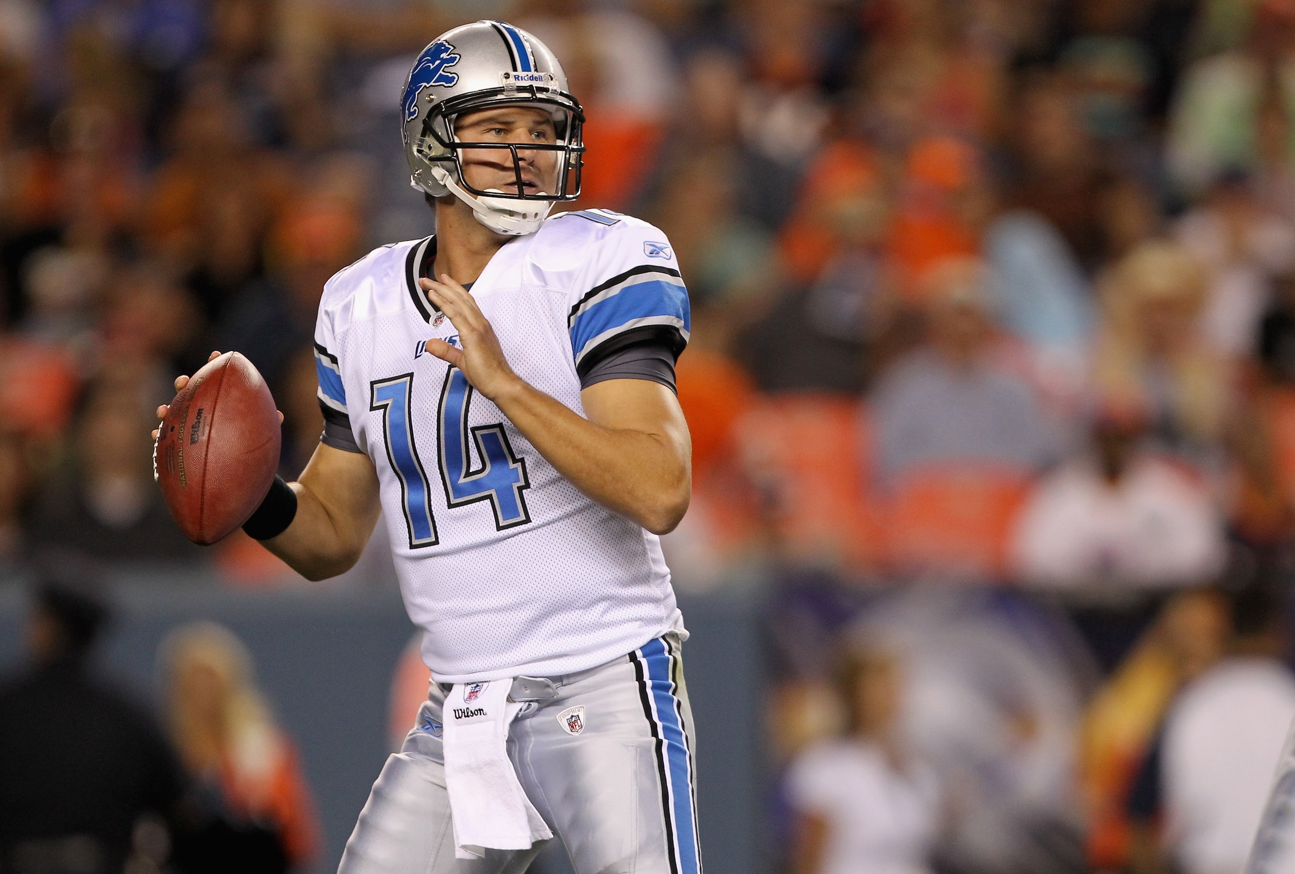 DENVER - AUGUST 21:  Quarterback Shaun Hill #14 of the Detroit Lions looks to deliver a pass against the Denver Broncos during preseason NFL action at INVESCO Field at Mile High on August 21, 2010 in Denver, Colorado. The Lions defeated the Broncos 25-20.
