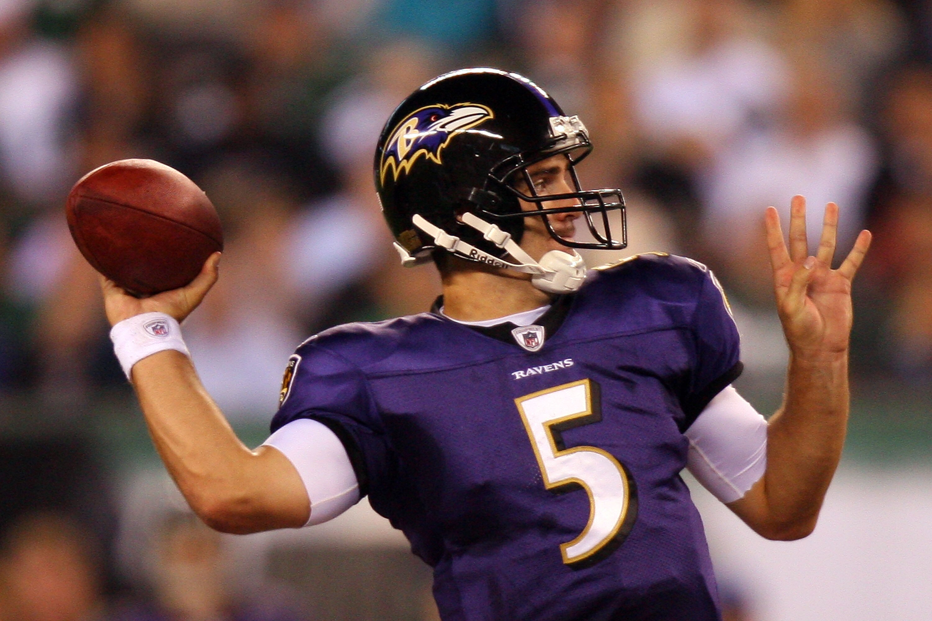 EAST RUTHERFORD, NJ - SEPTEMBER 13:  Joe Flacco #5 of the Baltimore Ravens throws a pass against the New York Jets during the home opener at the New Meadowlands Stadium on September 13, 2010 in East Rutherford, New Jersey.  (Photo by Andrew Burton/Getty I