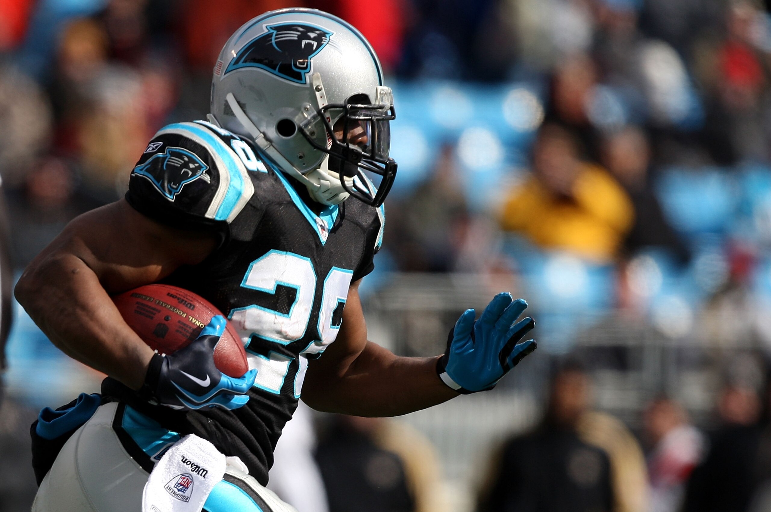 CHARLOTTE, NC - JANUARY 03:   Jonathan Stewart #28 of the Carolina Panthers runs with the ball against the New Orleans Saints during their game at Bank of America Stadium on January 3, 2010 in Charlotte, North Carolina.  (Photo by Streeter Lecka/Getty Ima