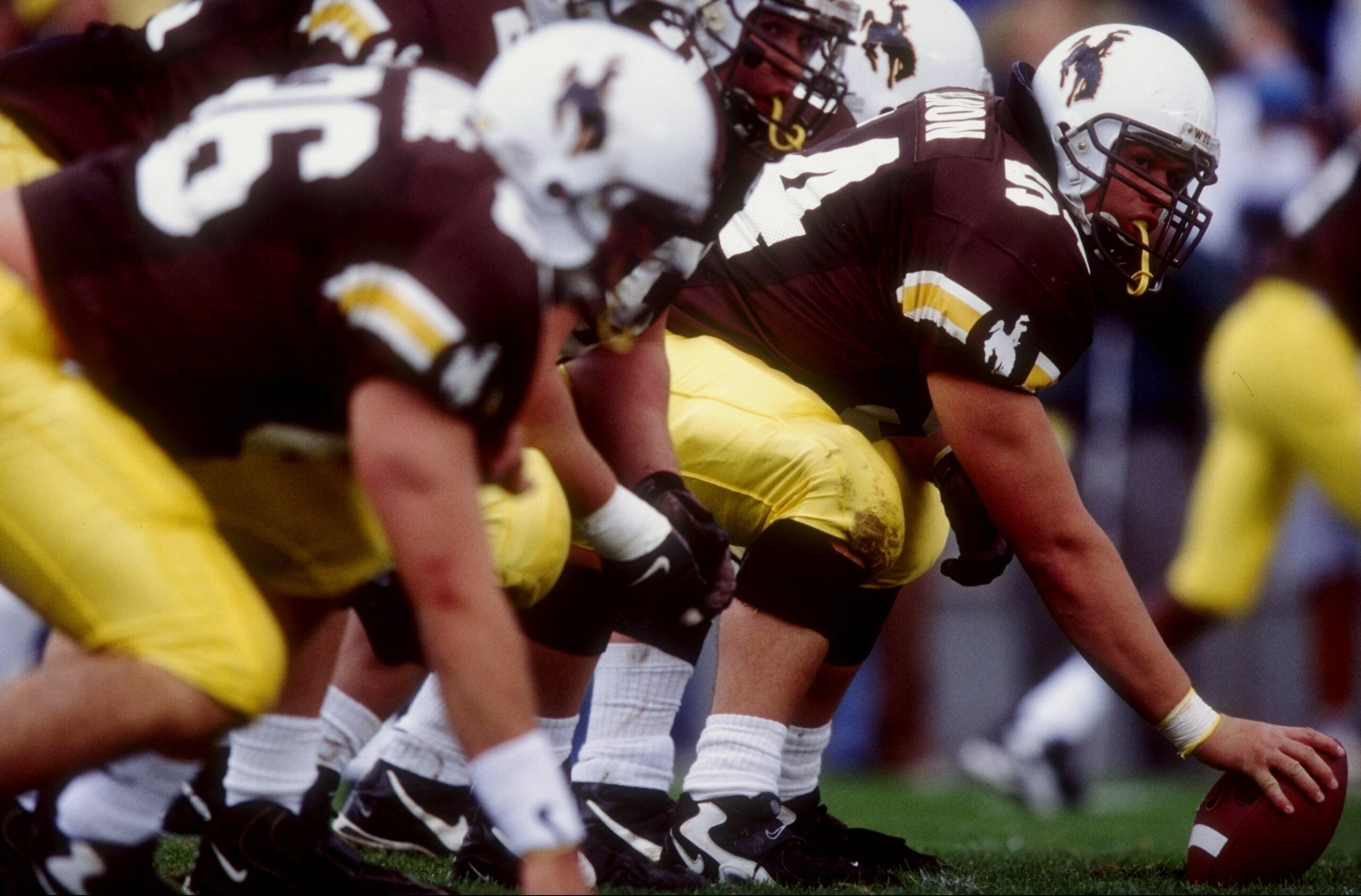 3 Oct 1998:  Scott Allmon #54 of the Wyoming Cowboys prepares to snap the ball during a game against the Utah Runnin'' Utes at the War Memorial Stadium in Laramie, Wyoming. The Cowboys defeated the Runnin'' Utes 27-24.