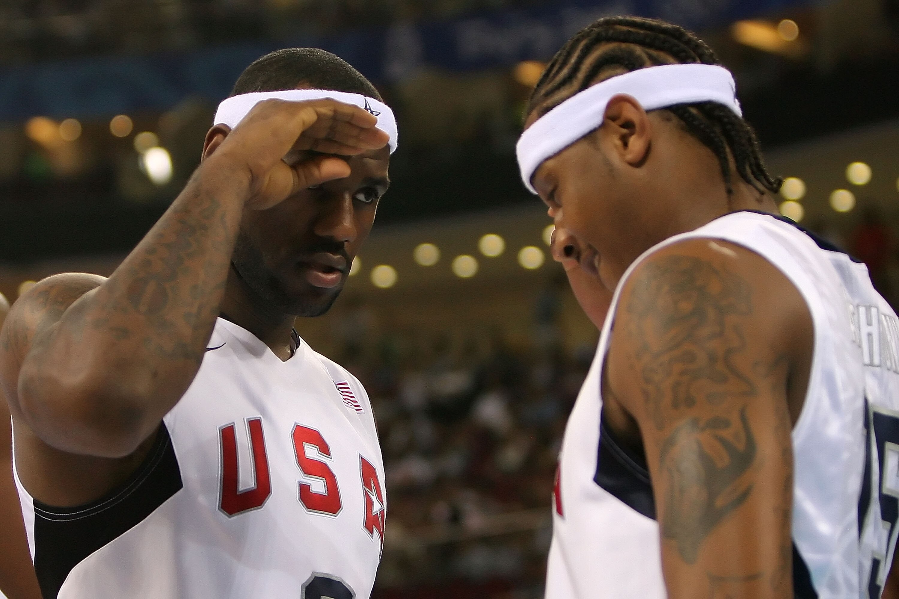 BEIJING - AUGUST 20:  Lebron James #6 and Carmelo Anthony #15 of the United States salute one another before the men's basketball quarterfinal game against Australia at the Olympic Basketball Gymnasium during Day 12 of the Beijing 2008 Olympic Games on Au