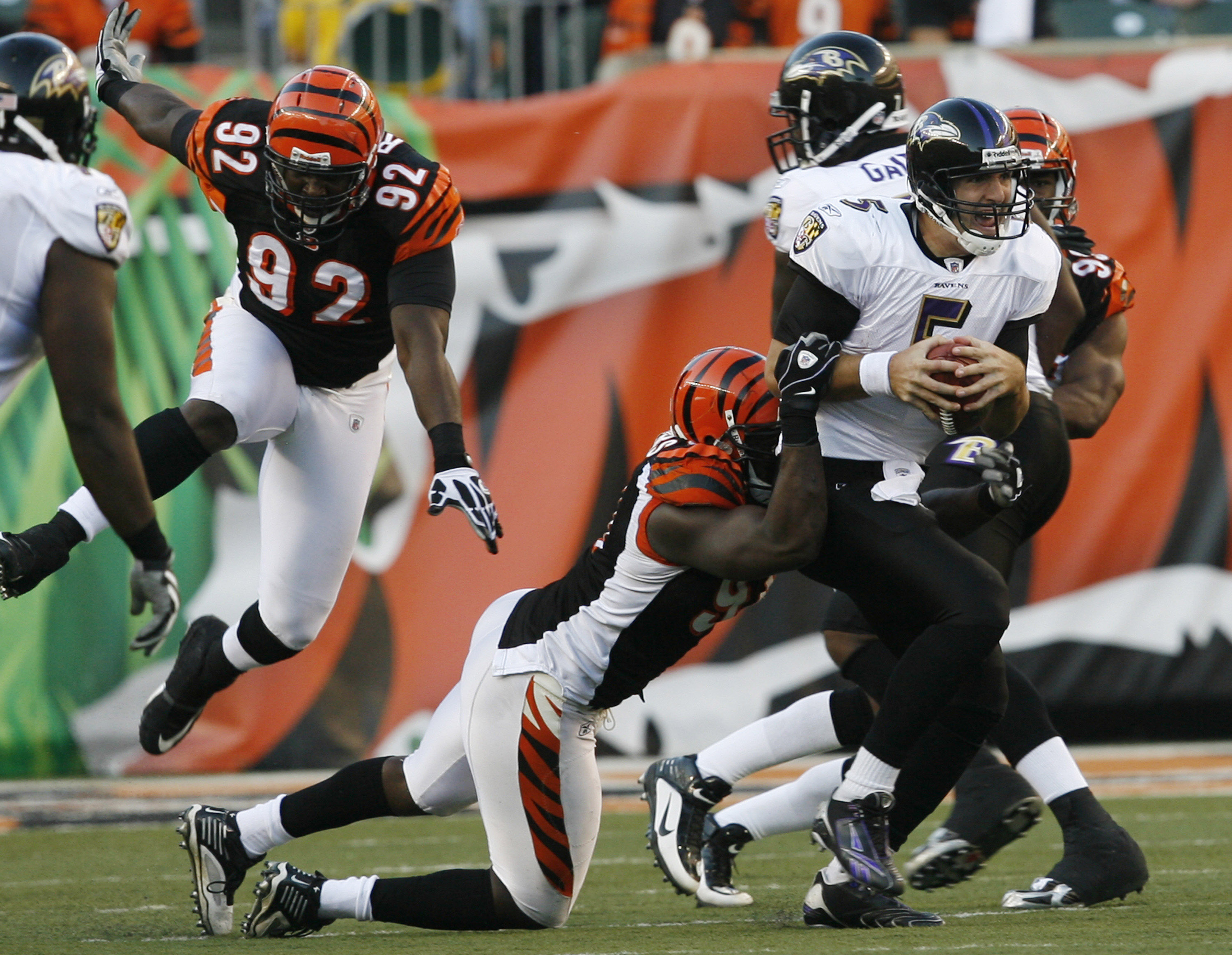 CINCINNATI - NOVEMBER 8: Carson Palmer #9 of the Cincinnati Bengals throws under pressure from the Baltimore Ravens at Paul Brown Stadium on November 8, 2009 in Cincinnati, Ohio.  (Photo by John Sommers II/Getty Images)