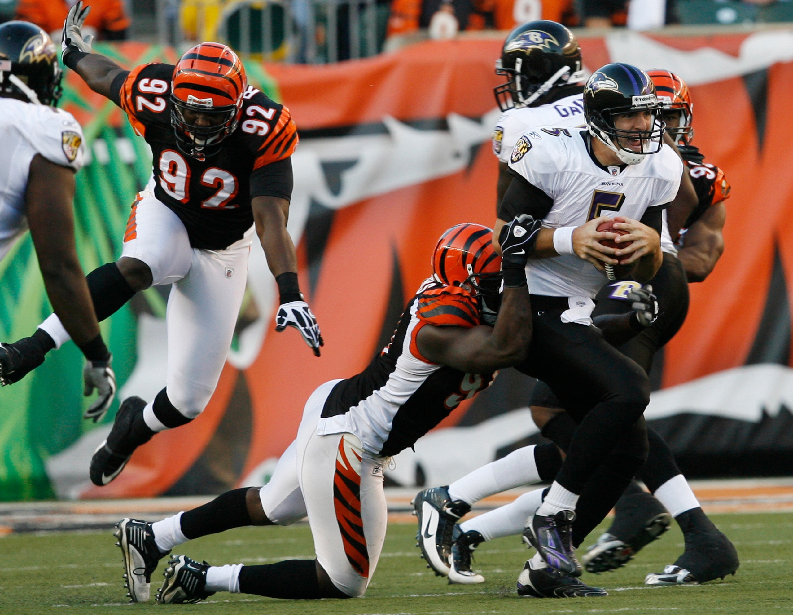 CINCINNATI - NOVEMBER 8: Carson Palmer #9 of the Cincinnati Bengals throws under pressure from the Baltimore Ravens at Paul Brown Stadium on November 8, 2009 in Cincinnati, Ohio.  (Photo by John Sommers II/Getty Images)