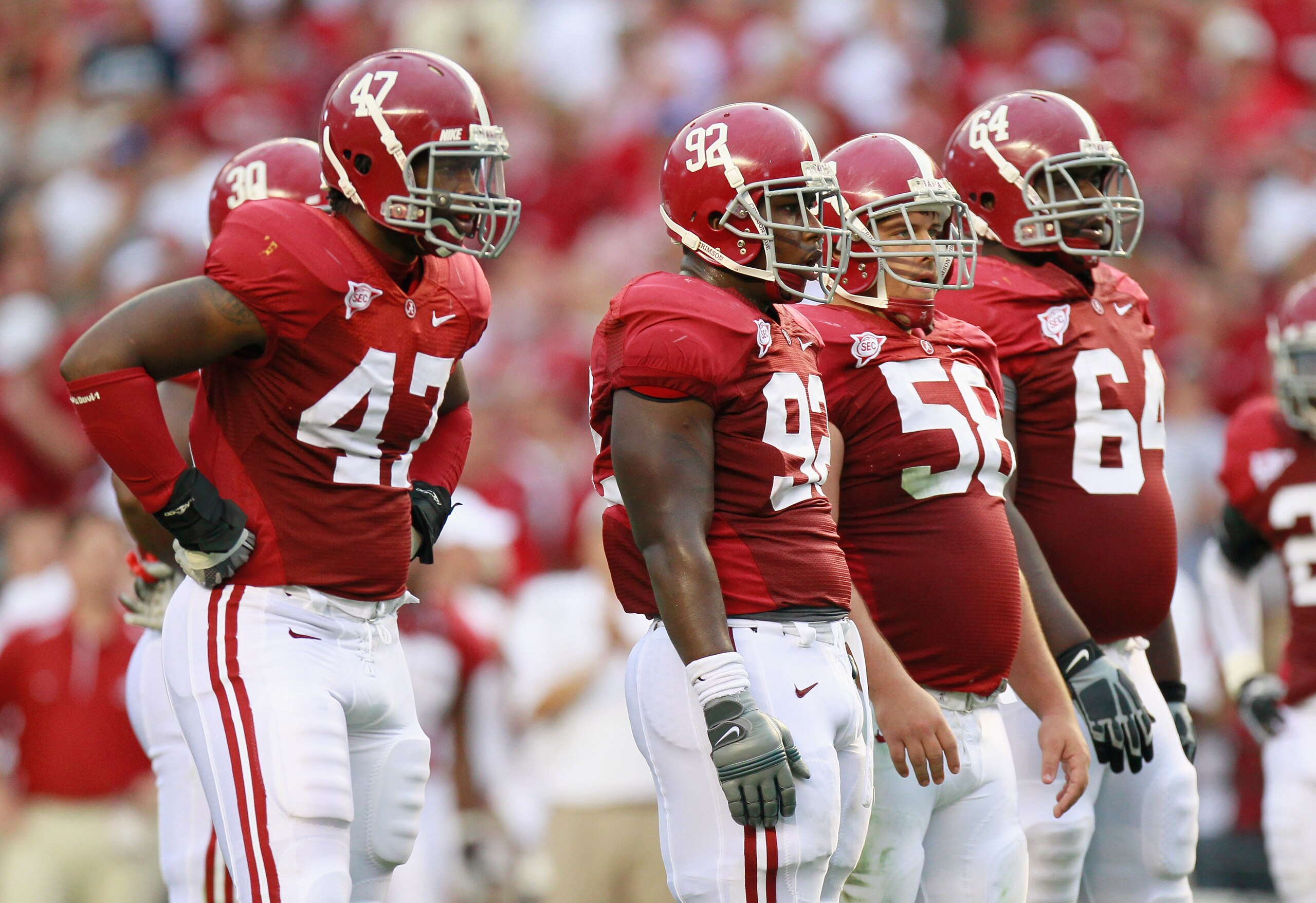 TUSCALOOSA, AL - SEPTEMBER 11:  (L-R) Ed Stinson #47, Damion Square #92, Nick Gentry #58, and Kerry Murphy #64 of the Alabama Crimson Tide against the Penn State Nittany Lions at Bryant-Denny Stadium on September 11, 2010 in Tuscaloosa, Alabama.  (Photo b
