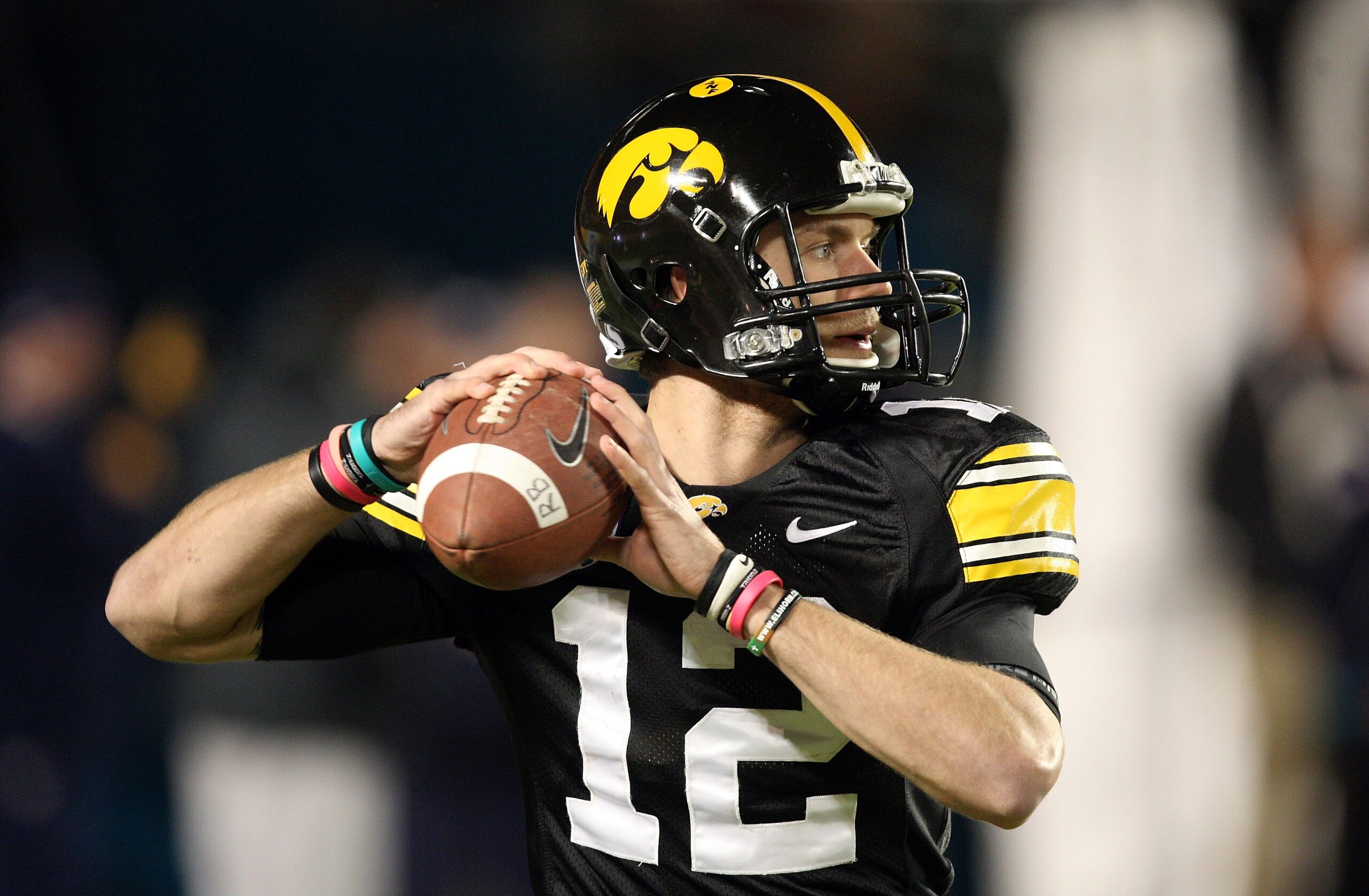 MIAMI GARDENS, FL - JANUARY 05:  Ricky Stanzi #12 of the Iowa Hawkeyes warms up against the Georgia Tech Yellow Jackets during the FedEx Orange Bowl at Land Shark Stadium on January 5, 2010 in Miami Gardens, Florida. Iowa won 24-14. (Photo by Streeter Lec