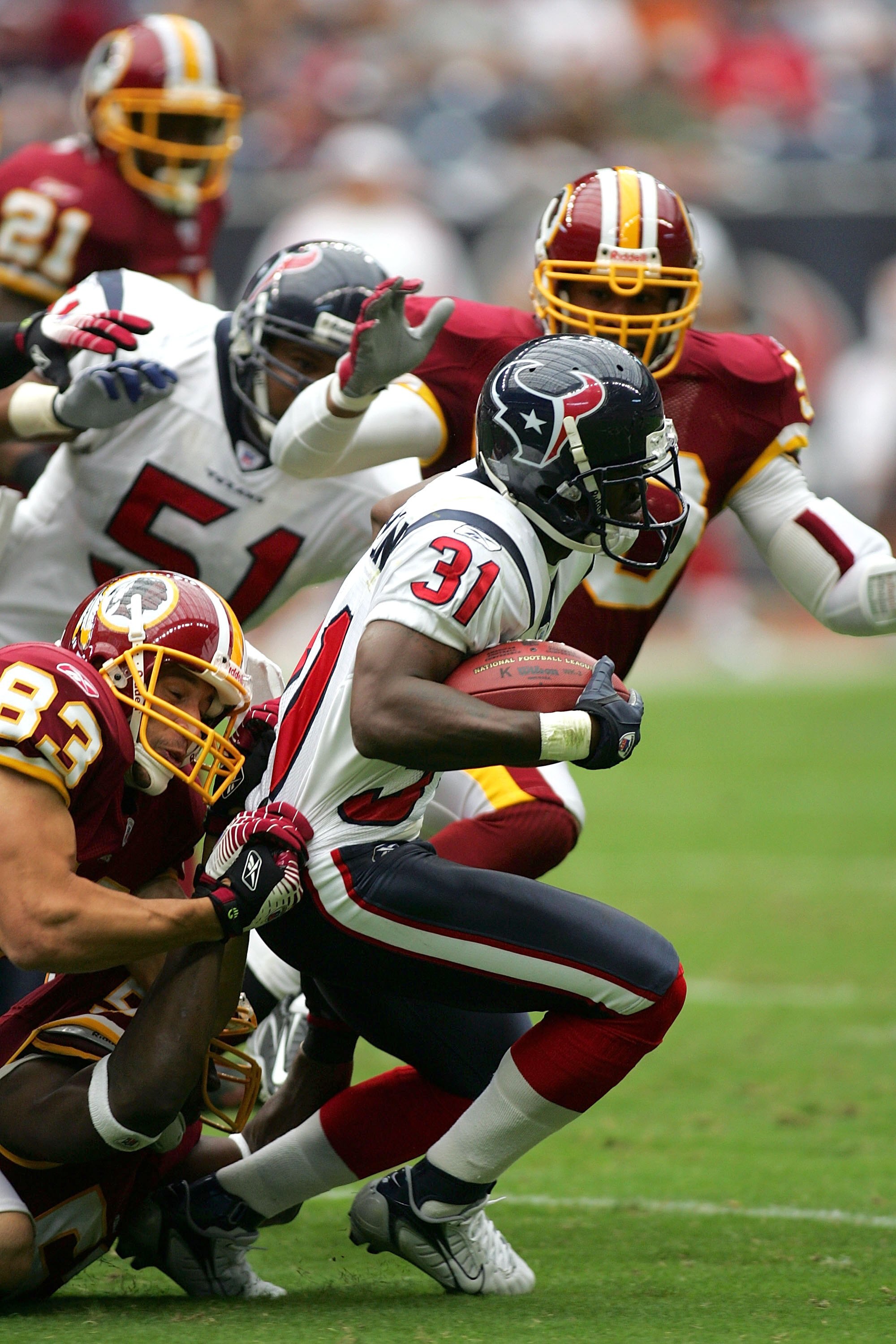HOUSTON - SEPTEMBER 24:  Cornerback Phillip Buchanon #31 of the Houston Texans runs against the Washington Redskins on September 24, 2006 at Reliant Stadium in Houston, Texas. The Redskins defeated the Texans 31-15.  (Photo by Ronald Martinez/Getty Images