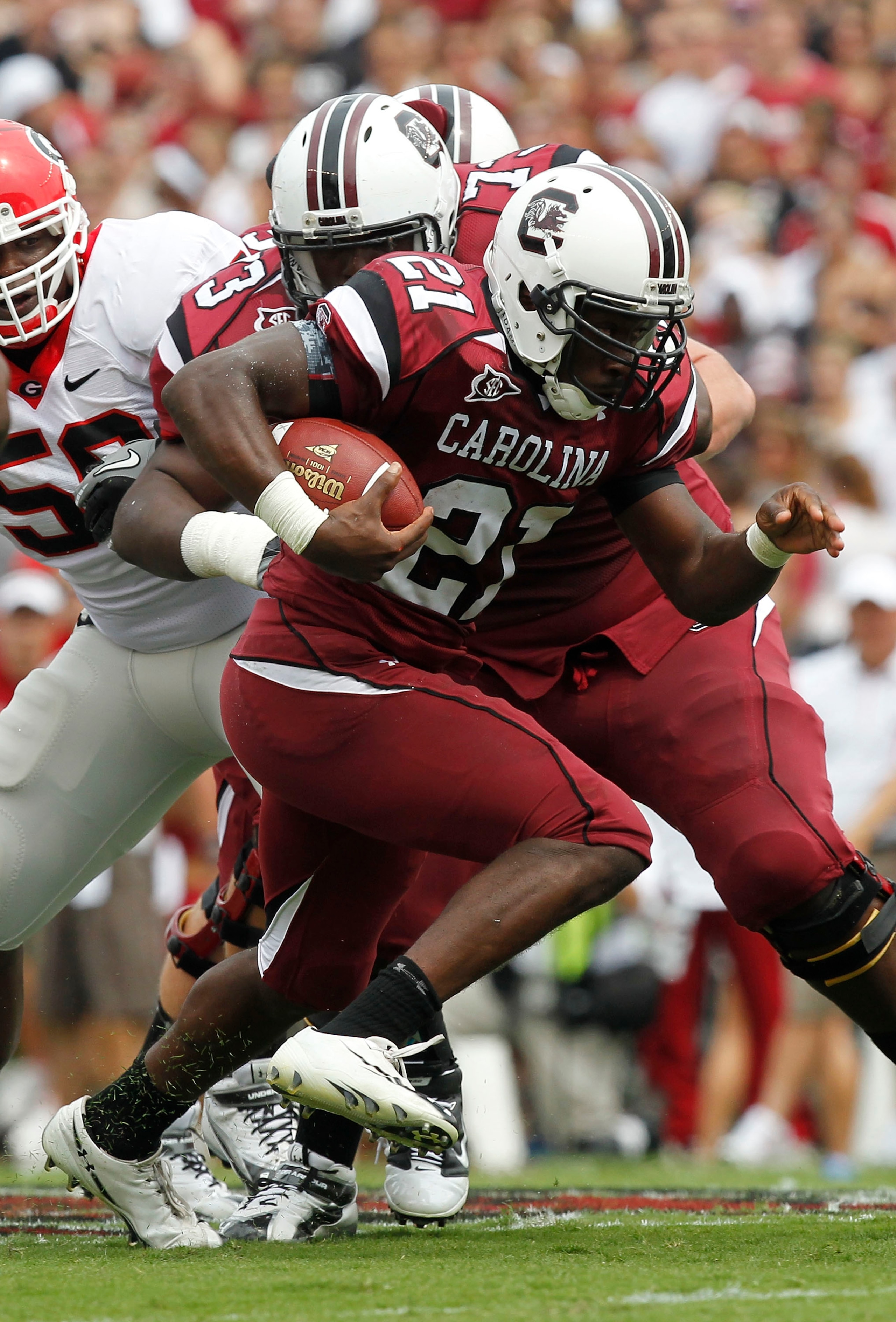 COLUMBIA - SEPTEMBER 11: Tailback Marcus Lattimore #21 of the South Carolina Gamecocks runs with the ball against the Georgia Bulldogs at Williams-Brice Stadium on September 11, 2010 in Columbia, South Carolina. (Photo by Mike Zarrilli/Getty Images)