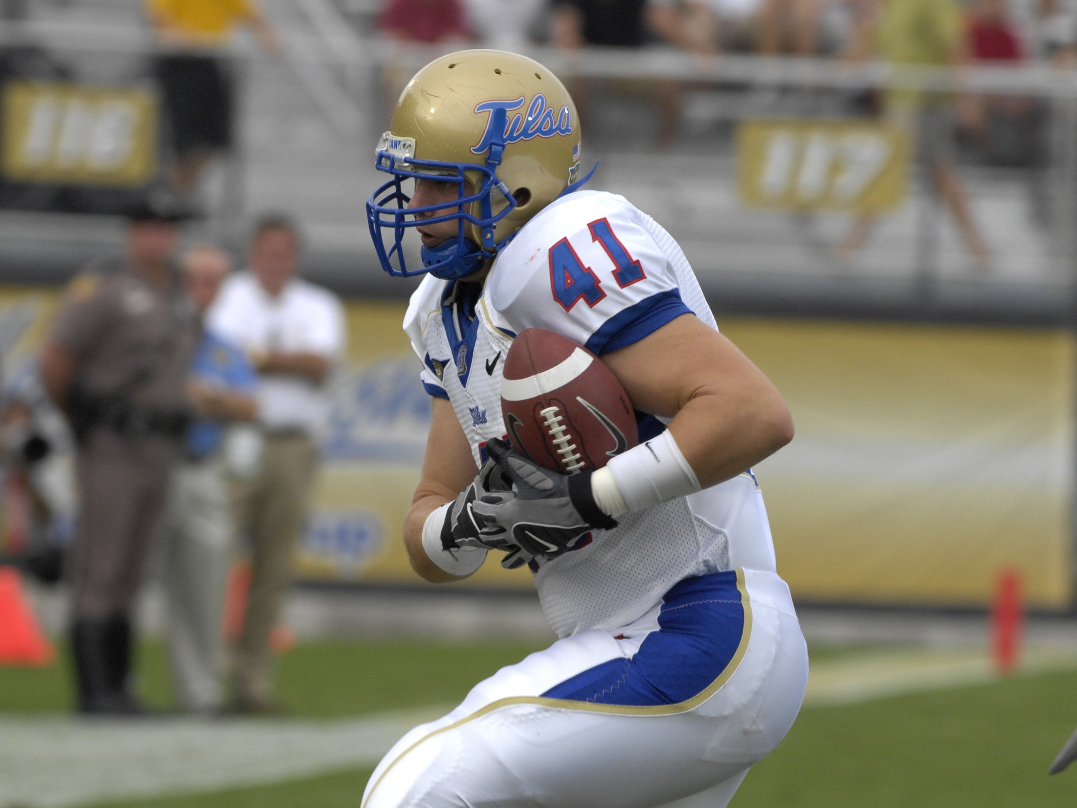 ORLANDO, FL - OCTOBER 20: Tight end Logan Cawyer #41 of the Tulsa Golden Hurricane clutches a pass against the University of Central Florida Knights at Bright House Stadium on October 20, 2007 in Orlando, Florida.  UCF won 44 - 23. (Photo by Al Messerschm