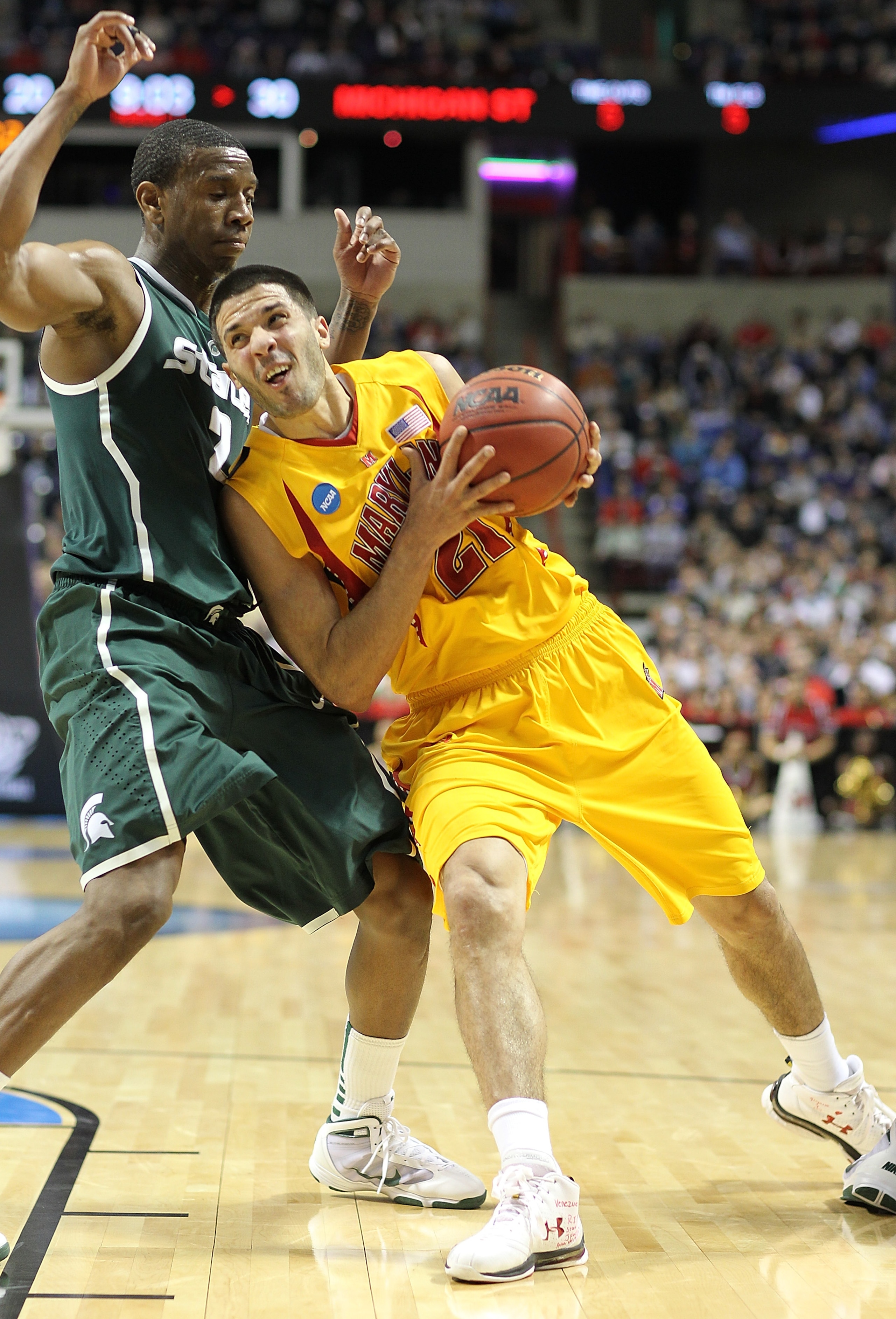 SPOKANE, WA - MARCH 21:  Greivis Vasquez #21 of the Maryland Terrapins drives against Raymar Morgan #2 of the Michigan State Spartans during the second round of the 2010 NCAA men's basketball tournament at the Spokane Arena on March 21, 2010 in Spokane, W