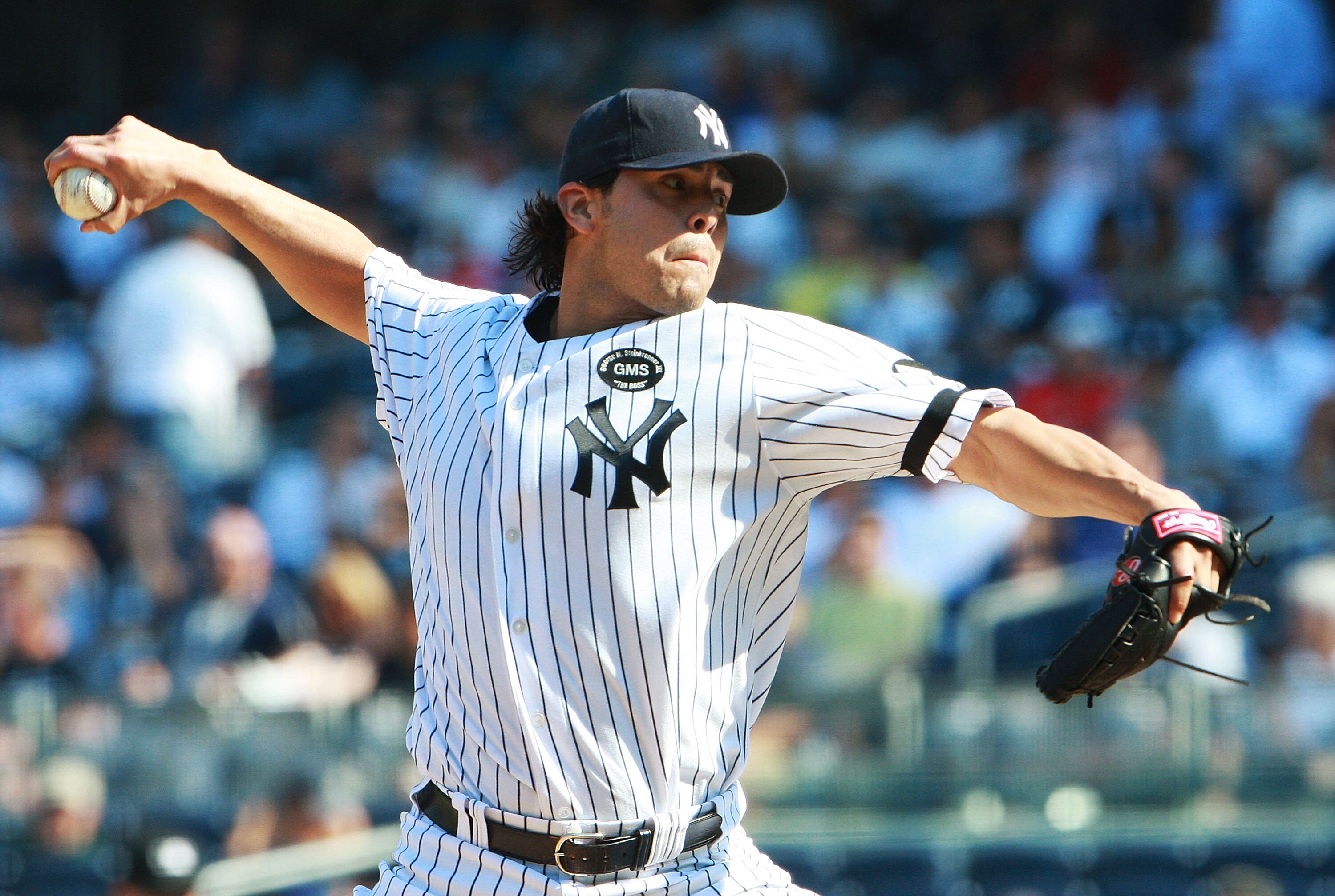 NEW YORK - AUGUST 19:  Sergio Mitre #45 the New York Yankees pitches against the Detroit Tigers at Yankee Stadium on August 19, 2010 in the Bronx borough of New York City.  (Photo by Andrew Burton/Getty Images)