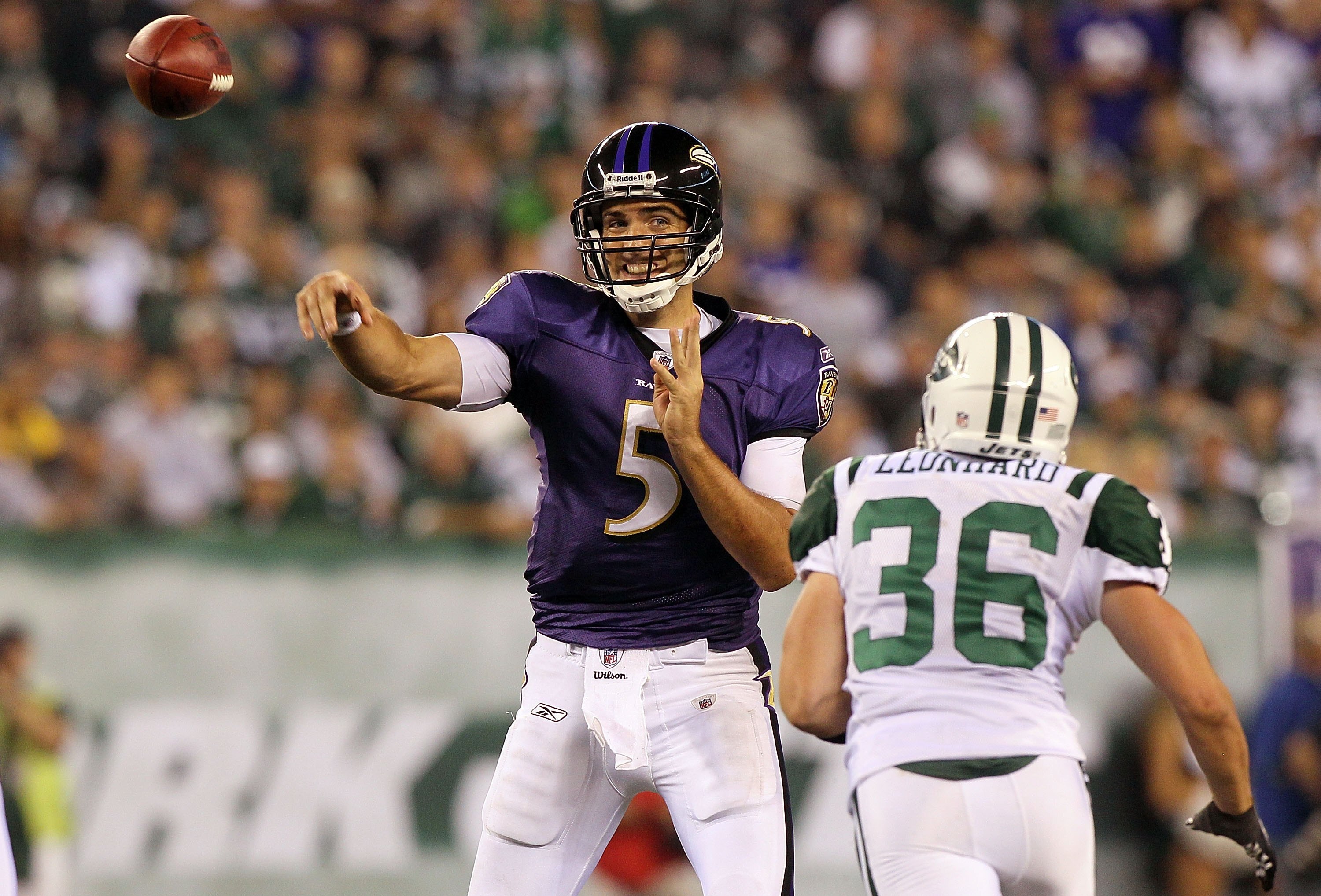 EAST RUTHERFORD, NJ - SEPTEMBER 13: Joe Flacco #5 of the Baltimore Ravens throws a pass against the New York Jets during the home opener at the New Meadowlands Stadium on September 13, 2010 in East Rutherford, New Jersey. (Photo by Jim McIsaac/Getty Image