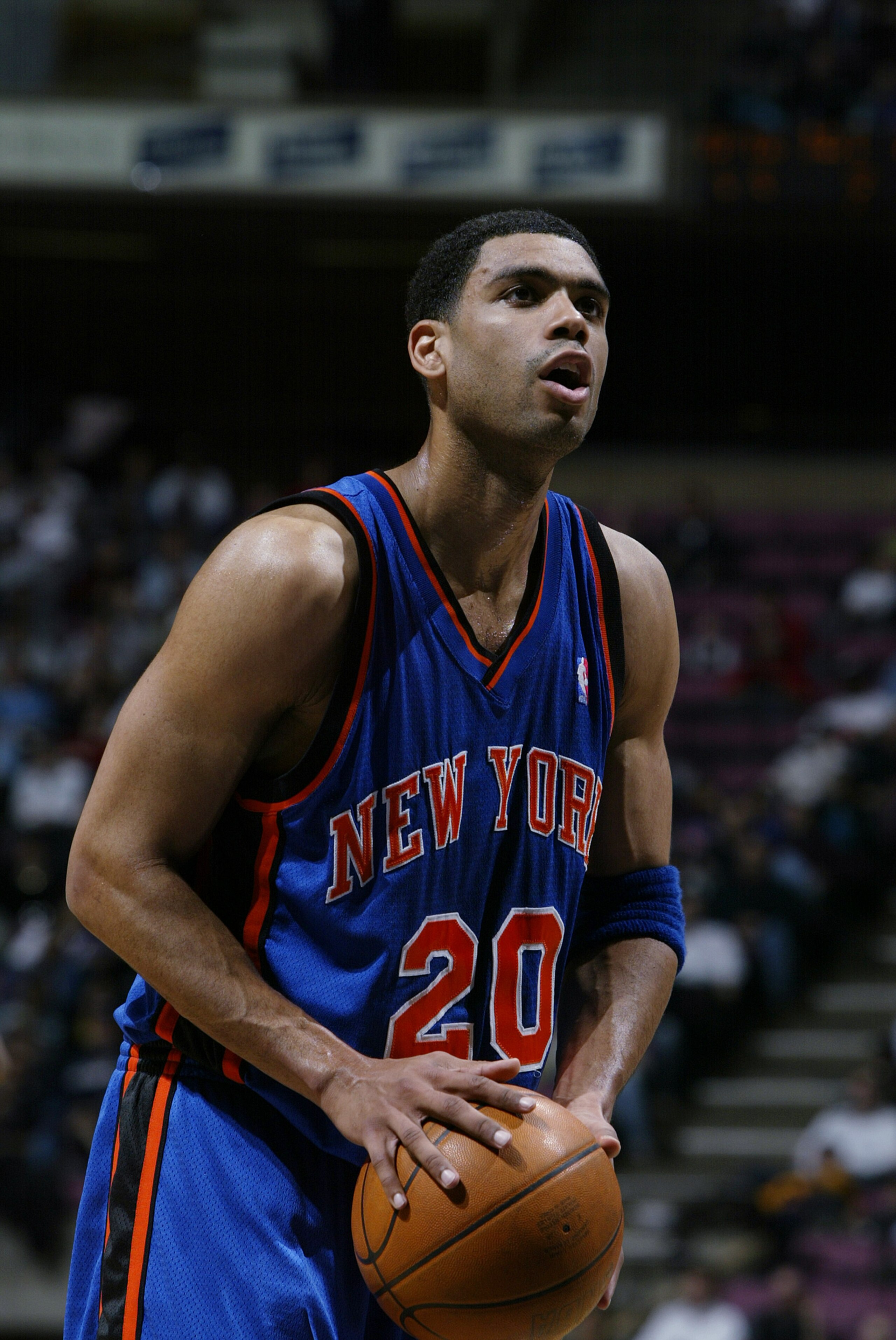 EAST RUTHERFORD, NJ - MARCH 26:  Allan Houston #20 of the New York Knicks prepares to shoot a free throw during the NBA game against the New Jersey Nets at Continental Airlines Arena on March 26, 2003 in East Rutherford, New Jersey.  The Nets won 101-95.