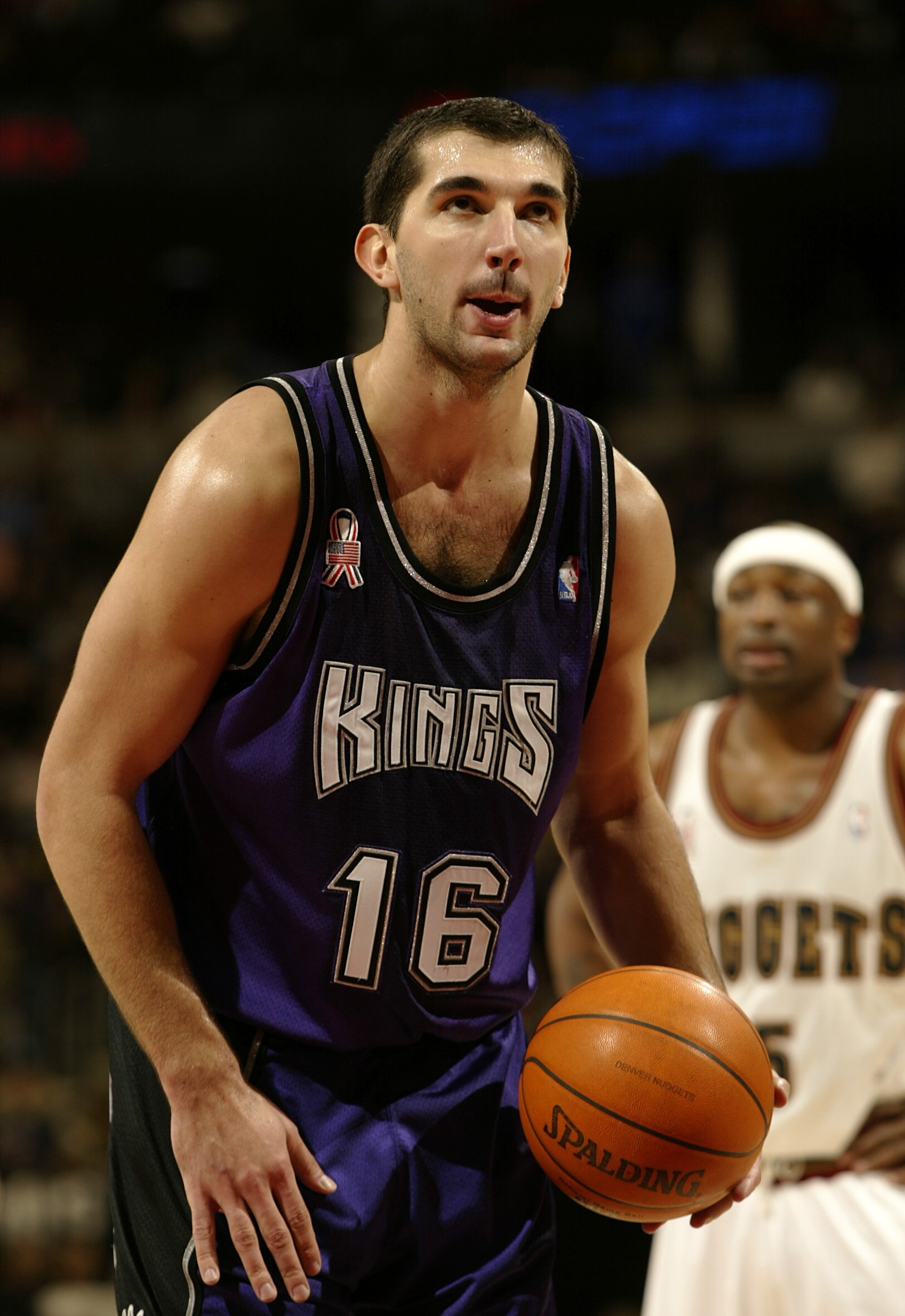 16 Jan 2002:   Peja Stojakovic #16 of the Sacramento Kings eyes the basket on a free throw against the Denver Nuggets in the second half at the Pepsi Center in Denver, Colorado.  The Kings won 112-107.   DIGITAL IMAGE    NOTE TO USER:  User expressly ackn