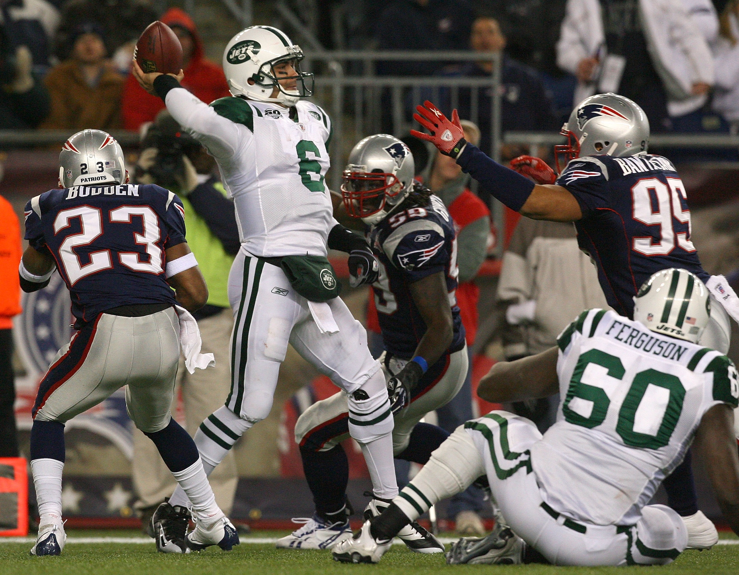 FOXBORO, MA - NOVEMBER 22:  Mark Sanchez #6 of the New York Jets feels the pressure of defense of the New England Patriots at Gillette Stadium on November 22, 2009 in Foxboro, Massachusetts. (Photo by Jim Rogash/Getty Images)