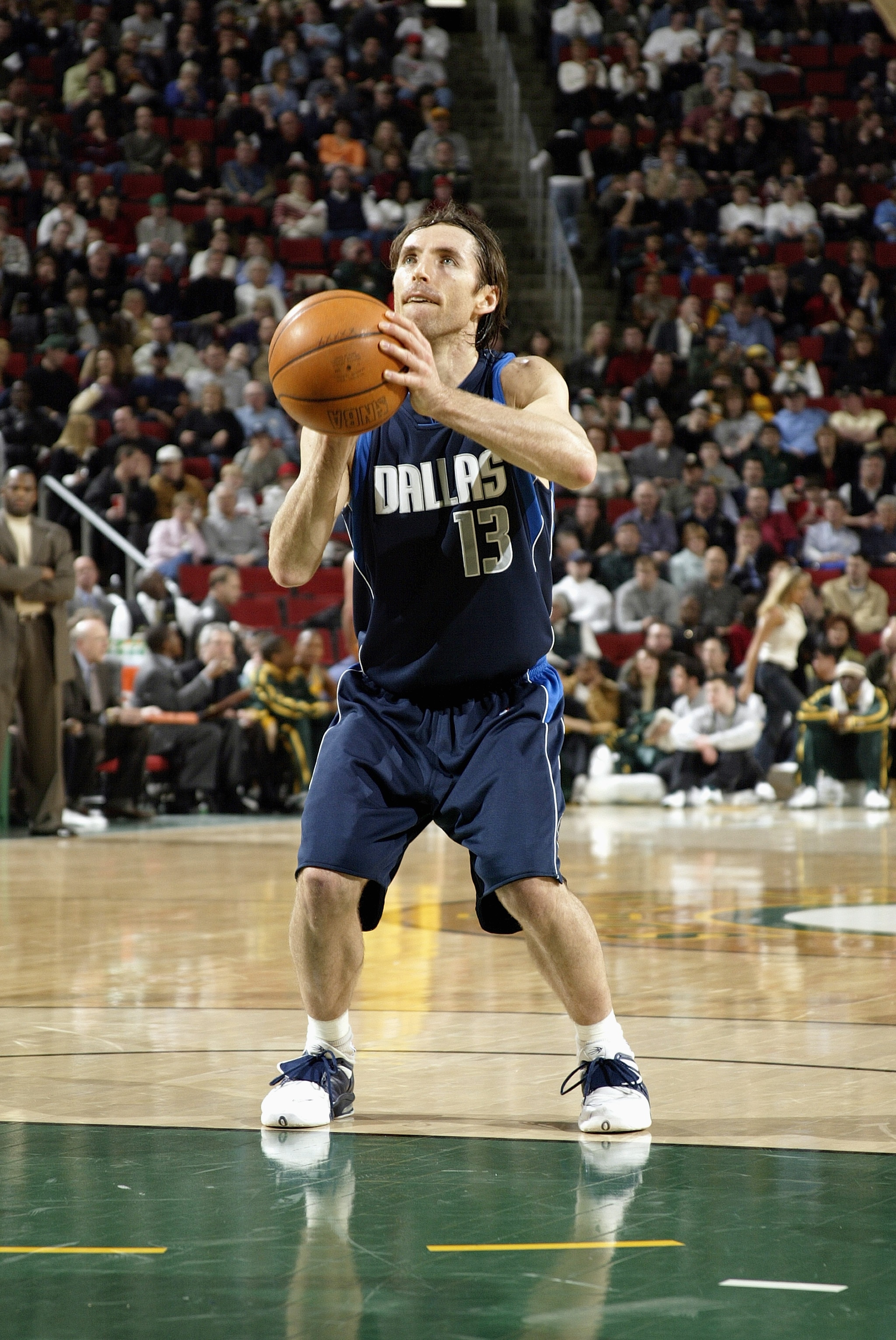 SEATTLE - JANUARY 27:  Steve Nash #13 of the Dallas Mavericks shoots a free throw during the game against the Seattle Sonics on January 27, 2004 at Key Arena in Seattle, Washington.  The Mavericks won 118-116.  NOTE TO USER: User expressly acknowledges an