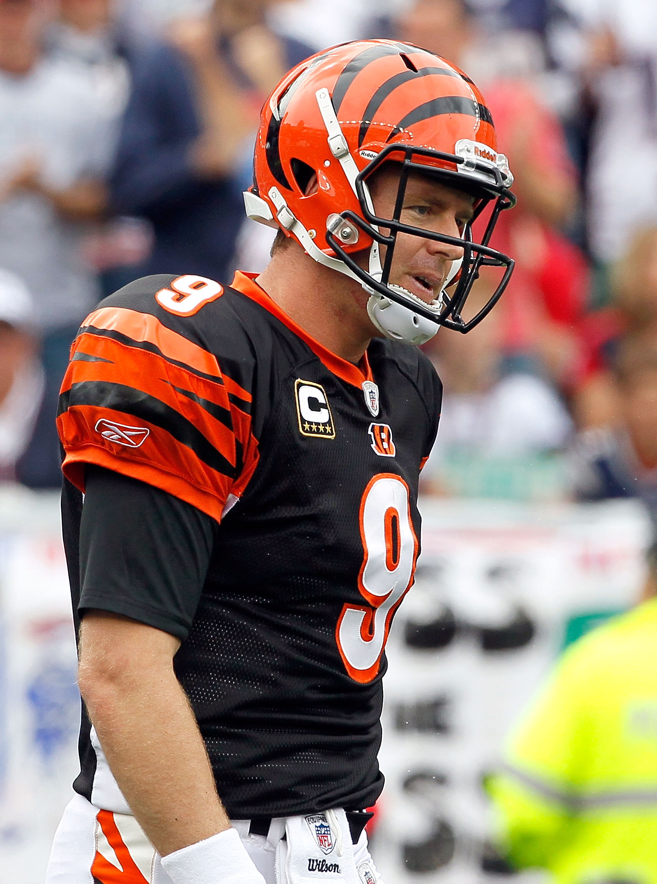FOXBORO, MA - SEPTEMBER 12: Quarterback Carson Palmer #9 of the Cincinnati Bengals reacts during the NFL season opener against the New England Patriots  at Gillette Stadium on September 12, 2010 in Foxboro, Massachusetts. (Photo by Jim Rogash/Getty Images