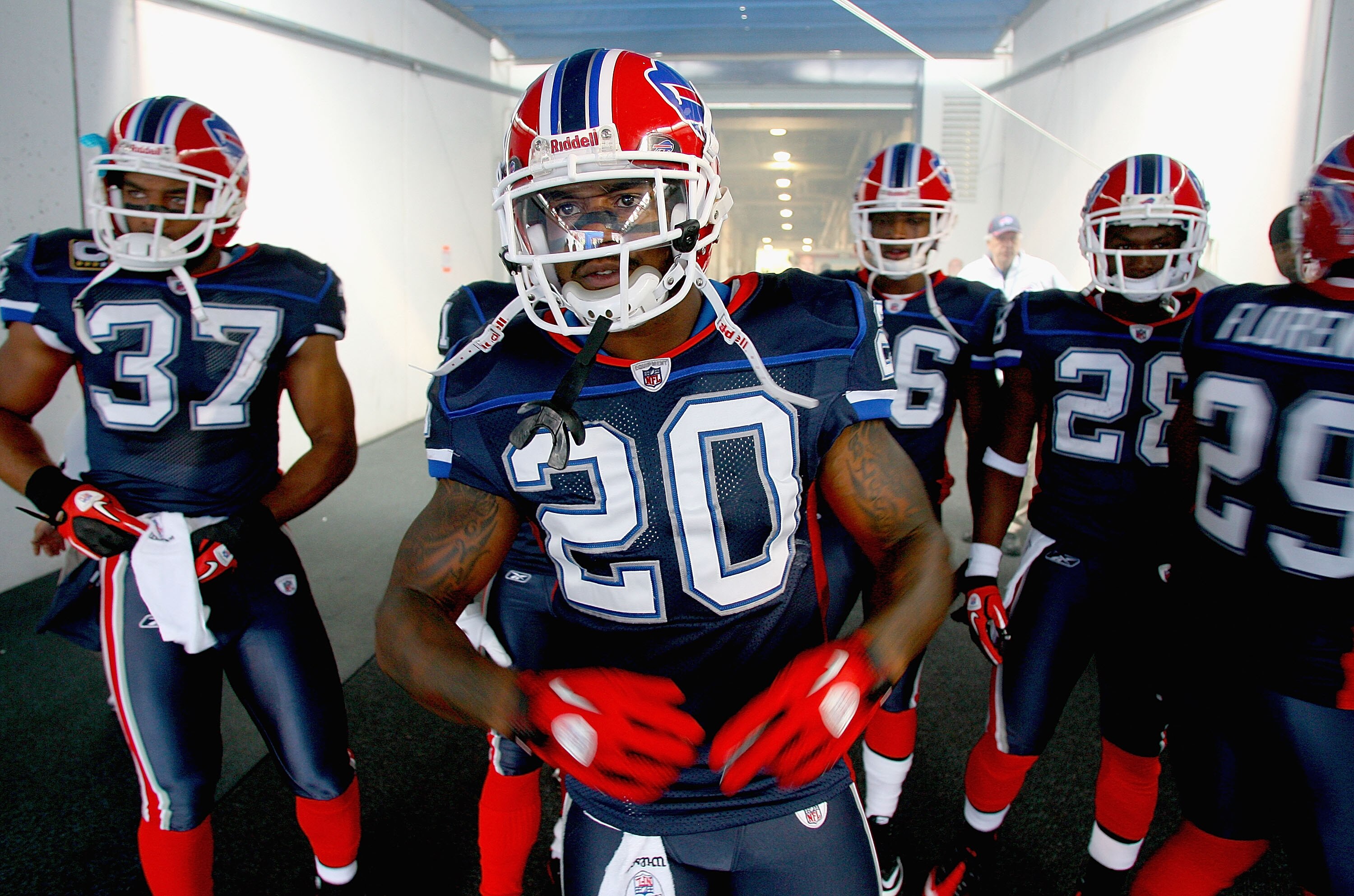 ORCHARD PARK, NY - SEPTEMBER 12: Donte Whitner #20 the Buffalo Bills waits with teammates to enter the field against the Miami Dolphins during the NFL season opener at Ralph Wilson Stadium on September 12, 2010 in Orchard Park, New York. Miami 15-10. (Pho ORCHARD PARK, NY - SEPTEMBER 12: Donte Whitner #20 the Buffalo Bills waits with teammates to enter the field against the Miami Dolphins during the NFL season opener at Ralph Wilson Stadium on September 12, 2010 in Orchard Park, New York. Miami 15-10. (Pho