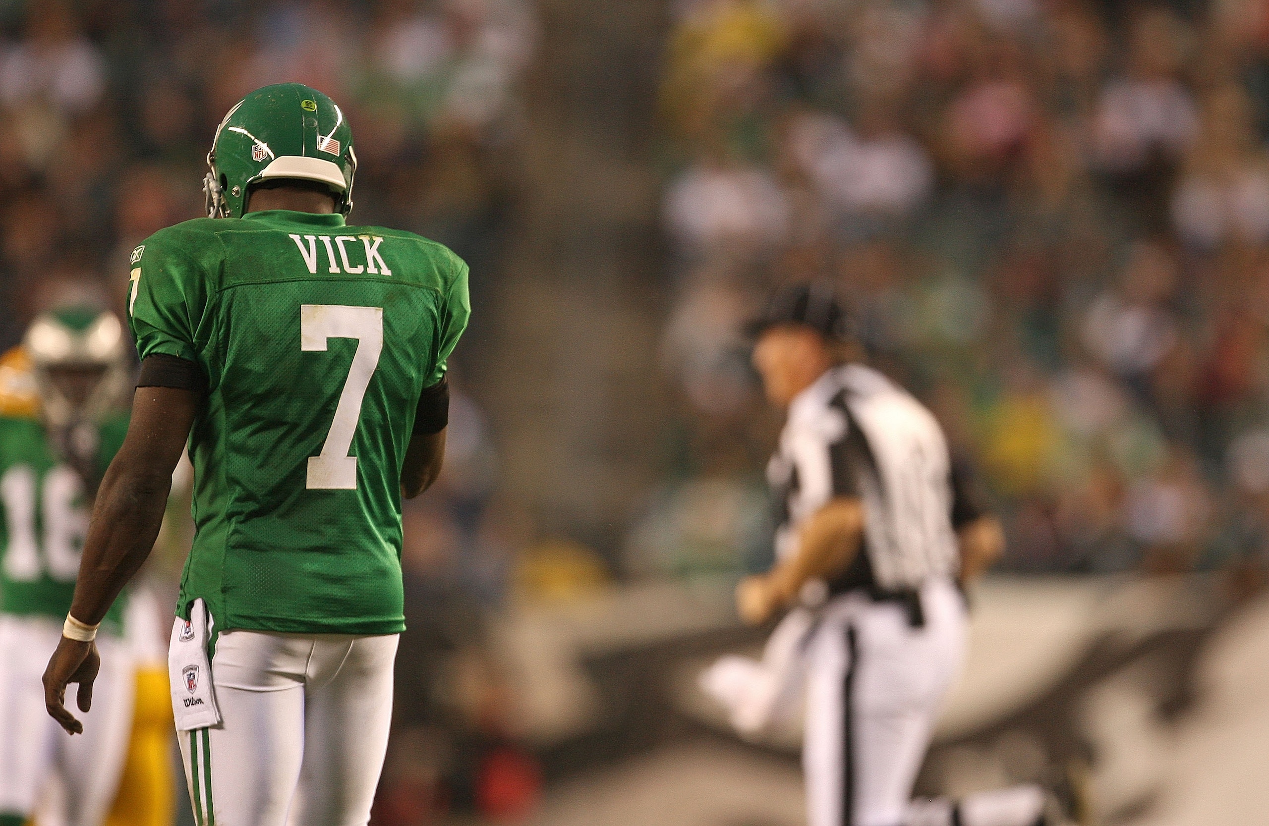 PHILADELPHIA - SEPTEMBER 12:  Michael Vick #7 of the Philadelphia Eagles walks to the sidelines during a game against the Green Bay Packers at Lincoln Financial Field on September 12, 2010 in Philadelphia, Pennsylvania.  (Photo by Mike Ehrmann/Getty Image