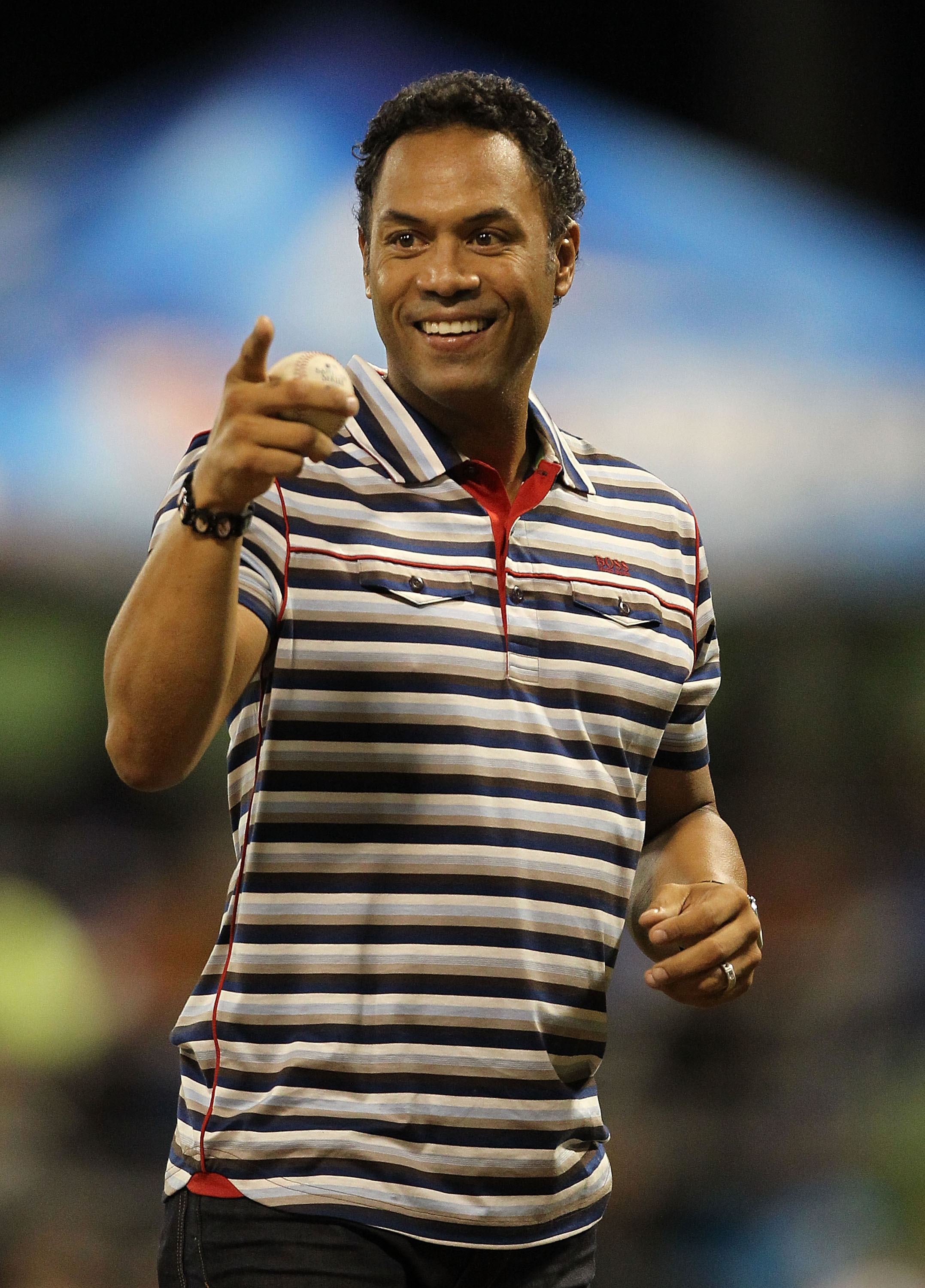 SAN JUAN, PUERTO RICO - JUNE 30:  Roberto Alomar Jr. throws out the first pitch before the game between the New York Mets and the Florida Marlins  during their game at Hiram Bithorn Stadium on June 30, 2010 in San Juan, Puerto Rico.  (Photo by Al Bello/Ge