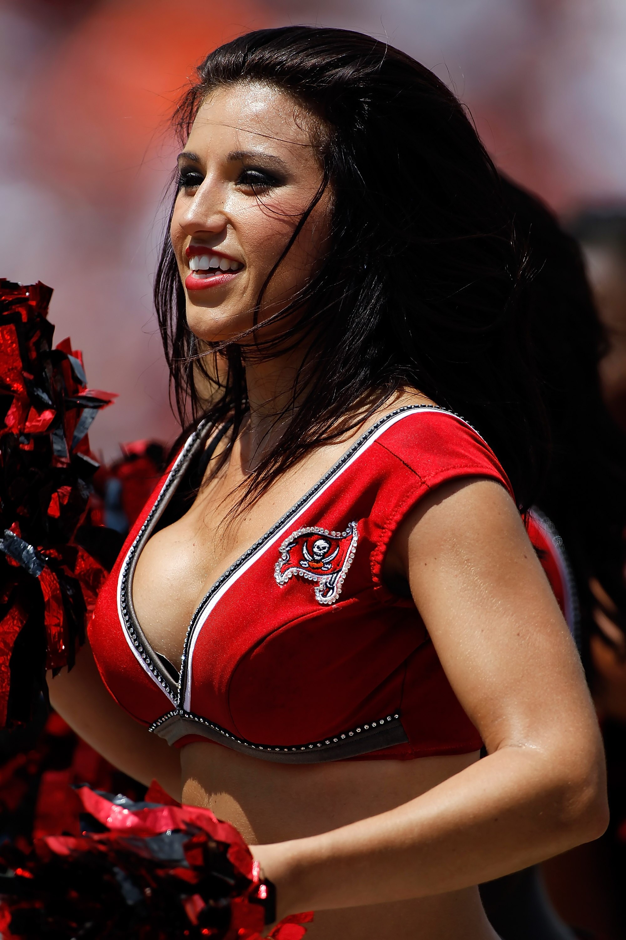 TAMPA, FL - SEPTEMBER 12:  A cheerleader of the Tampa Bay Buccaneers performs during the NFL season opener game against the Cleveland Browns at Raymond James Stadium on September 12, 2010 in Tampa, Florida.  (Photo by J. Meric/Getty Images)