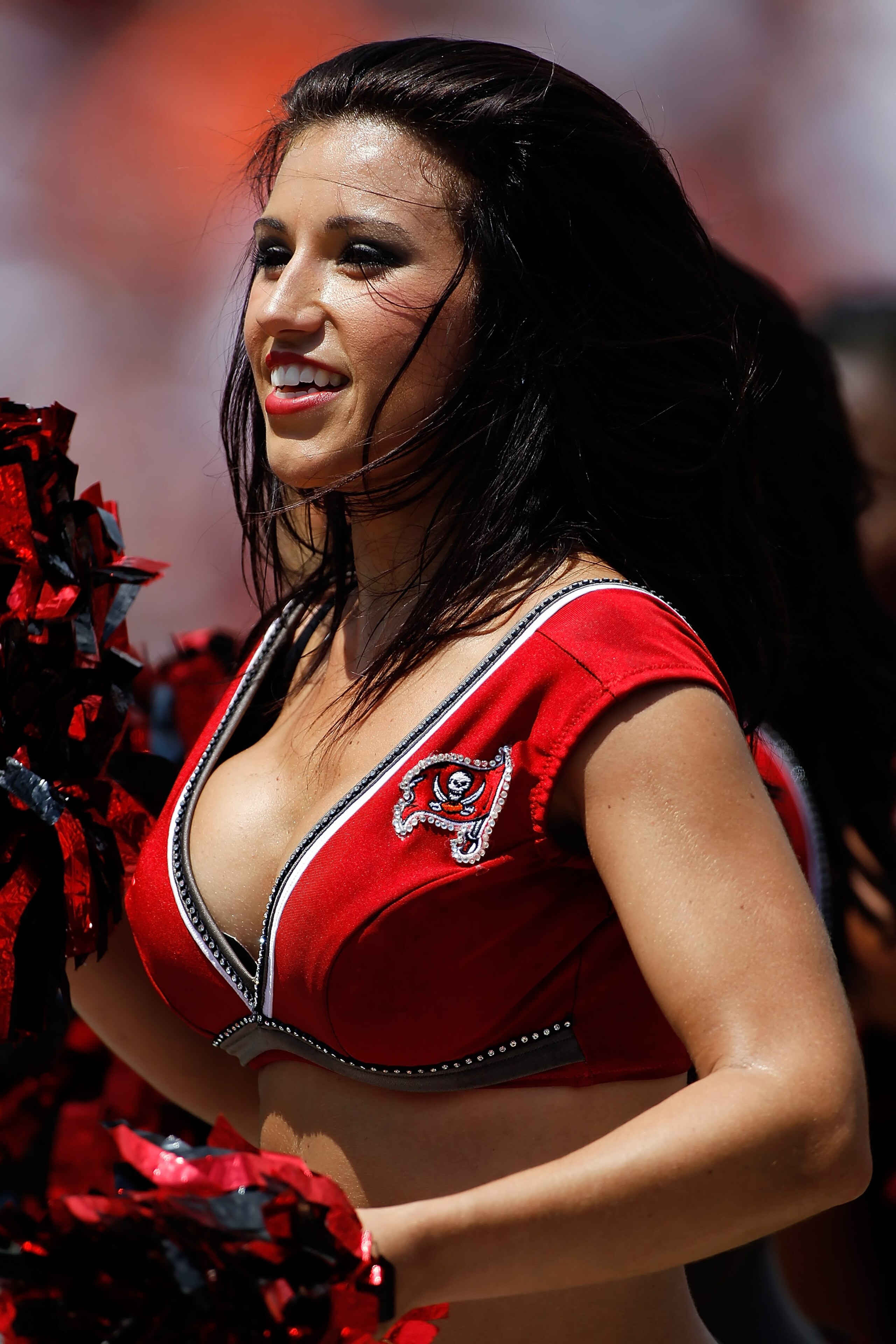 TAMPA, FL - SEPTEMBER 12:  A cheerleader of the Tampa Bay Buccaneers performs during the NFL season opener game against the Cleveland Browns at Raymond James Stadium on September 12, 2010 in Tampa, Florida.  (Photo by J. Meric/Getty Images)