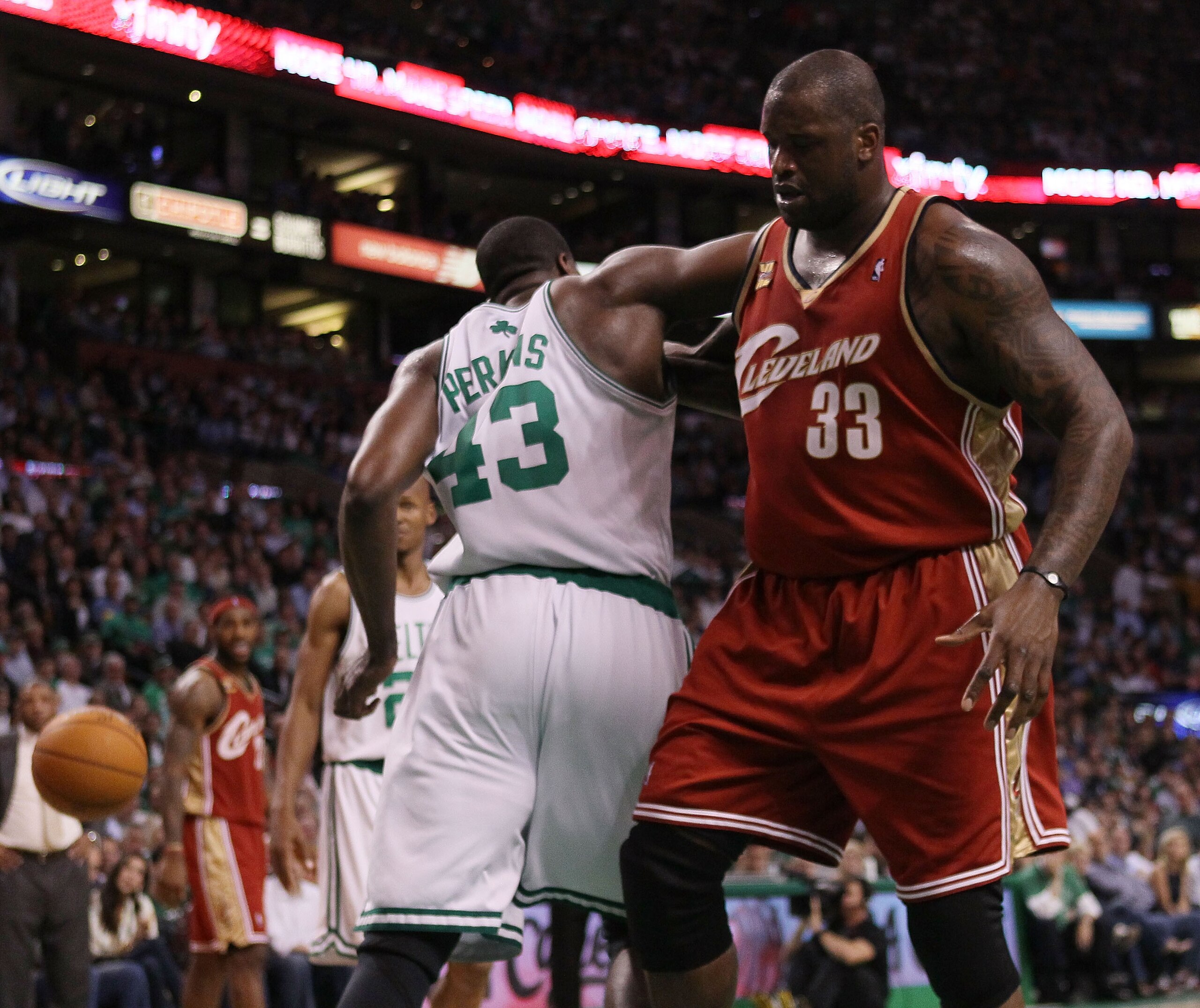 BOSTON - MAY 13: Kendrick Perkins #43 of the Boston Celtics and Shaquille O'Neal #33 of the Cleveland Cavaliers fight for the ball during Game Six of the Eastern Conference Semifinals of the 2010 NBA playoffs at TD Garden on May 13, 2010 in Boston, Massa BOSTON - MAY 13: Kendrick Perkins #43 of the Boston Celtics and Shaquille O'Neal #33 of the Cleveland Cavaliers fight for the ball during Game Six of the Eastern Conference Semifinals of the 2010 NBA playoffs at TD Garden on May 13, 2010 in Boston, Massa