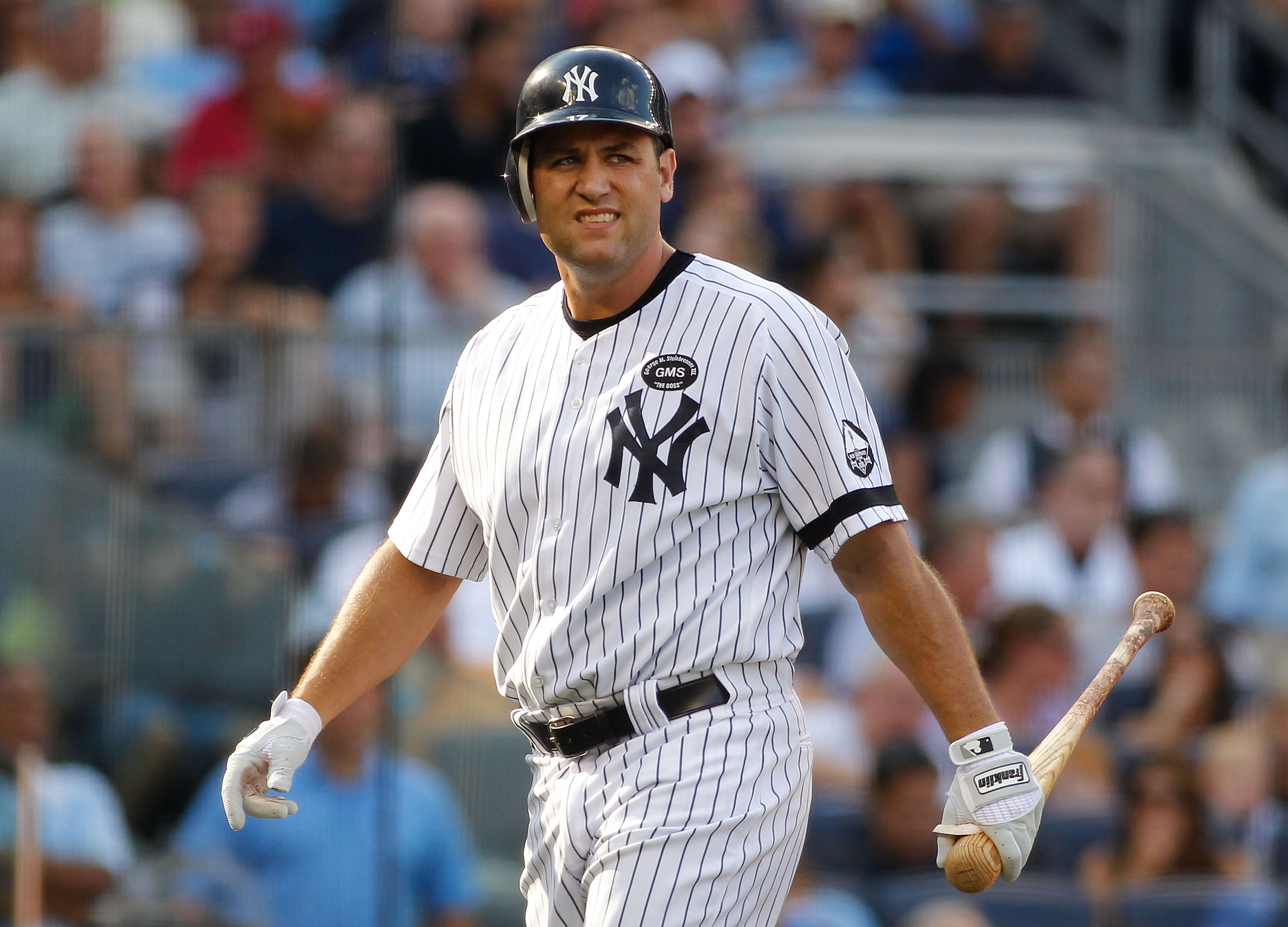 NEW YORK - AUGUST 07:  Lance Berkman #17 of the New York Yankees walks back to the bench after striking out against the Boston Red Sox on August 7, 2010 at Yankee Stadium in the Bronx borough of New York City.  (Photo by Mike Stobe/Getty Images)