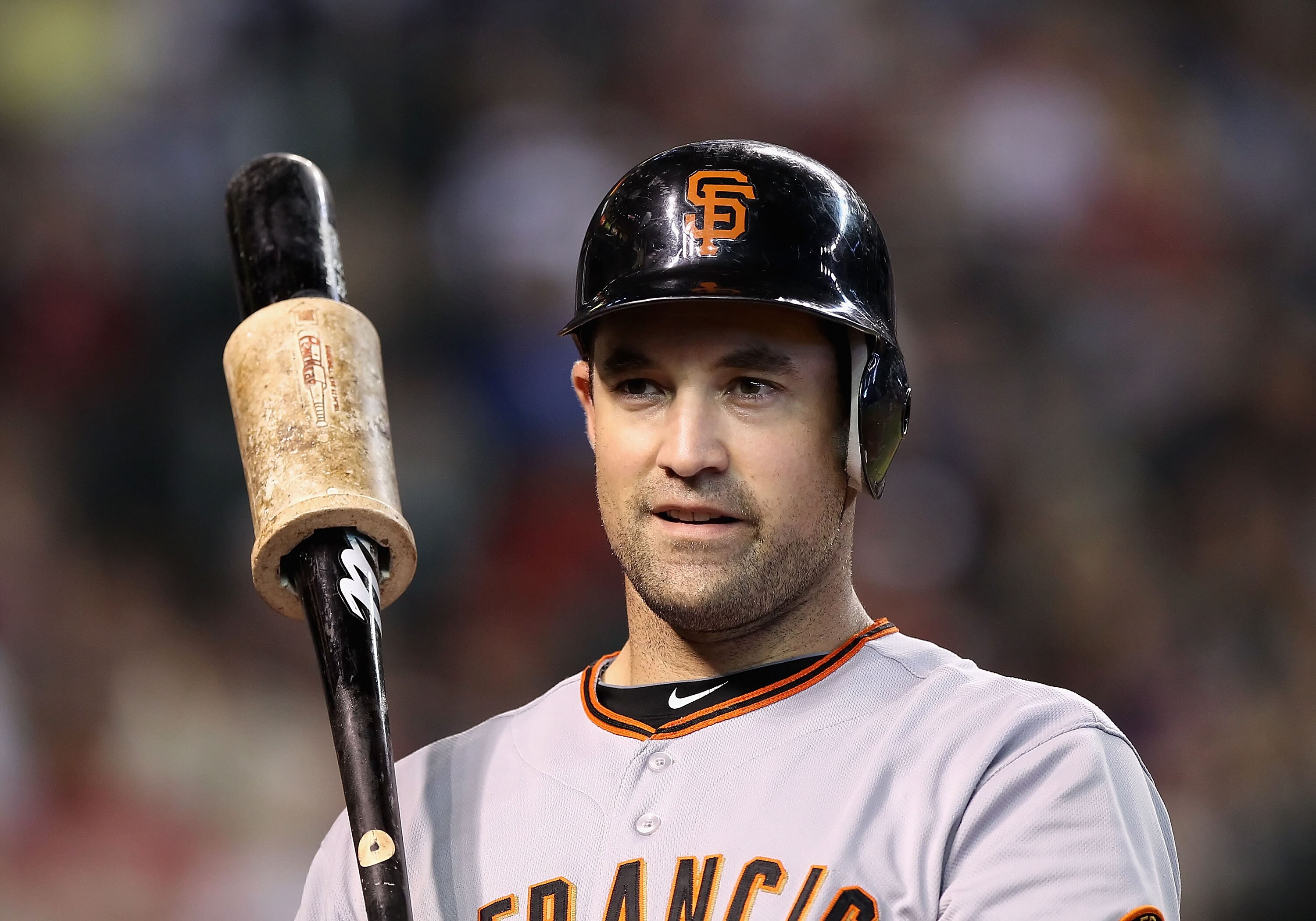 PHOENIX - SEPTEMBER 06:  Pat Burrell #9 of the San Francisco Giants waits to bat on deck during the Major League Baseball game against the Arizona Diamondbacks at Chase Field on September 6, 2010 in Phoenix, Arizona. The Giants defeated the Diamondbacks 2
