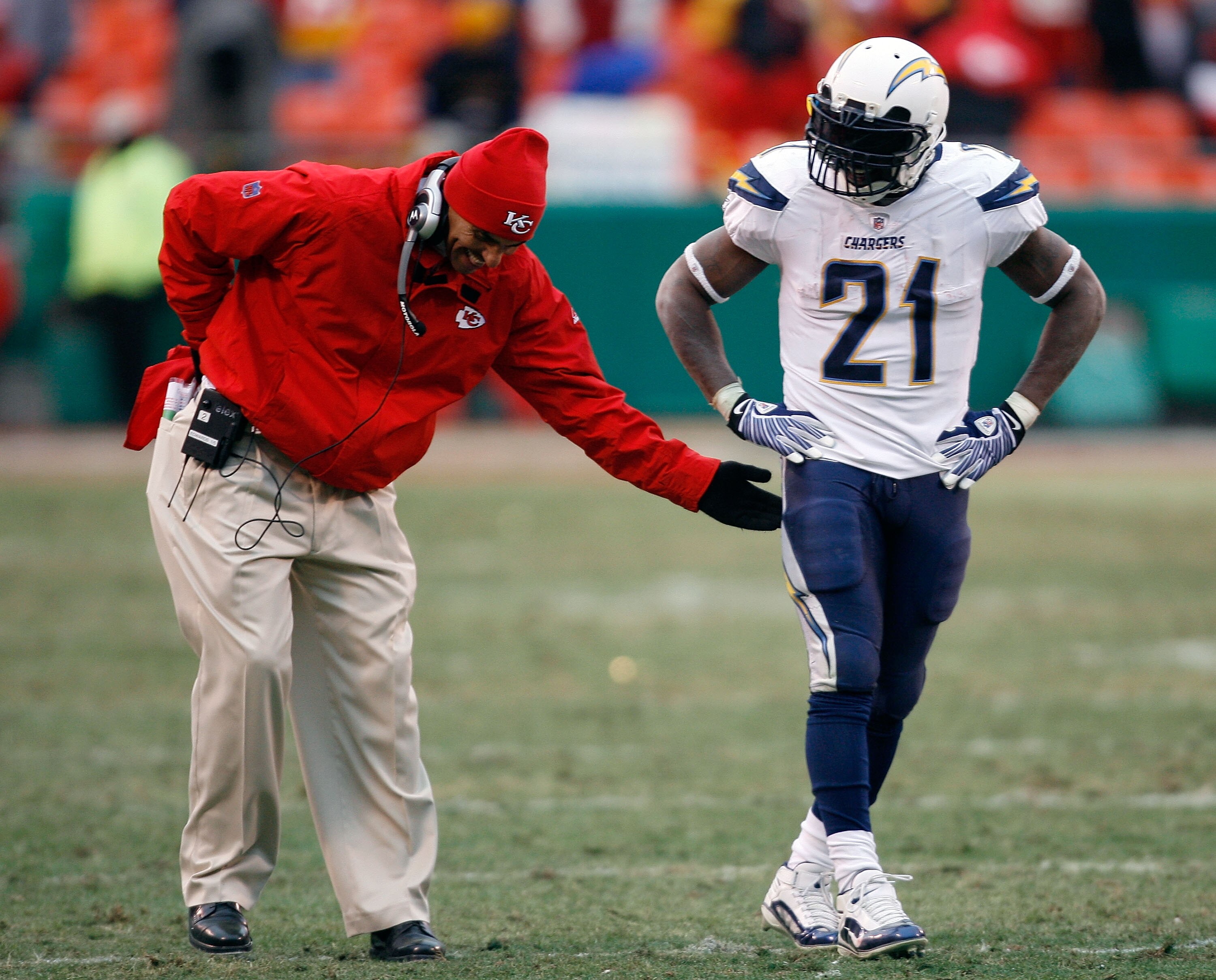 KANSAS CITY, MO - DECEMBER 14:  Head Coach Herm Edwards of the Kansas City Chiefs jokes with LaDainian Tomlinson #21 of the San Diego Chargers during the second half on December 14, 2008 at Arrowhead Stadium in Kansas City, Missouri.  (Photo by Harry How/