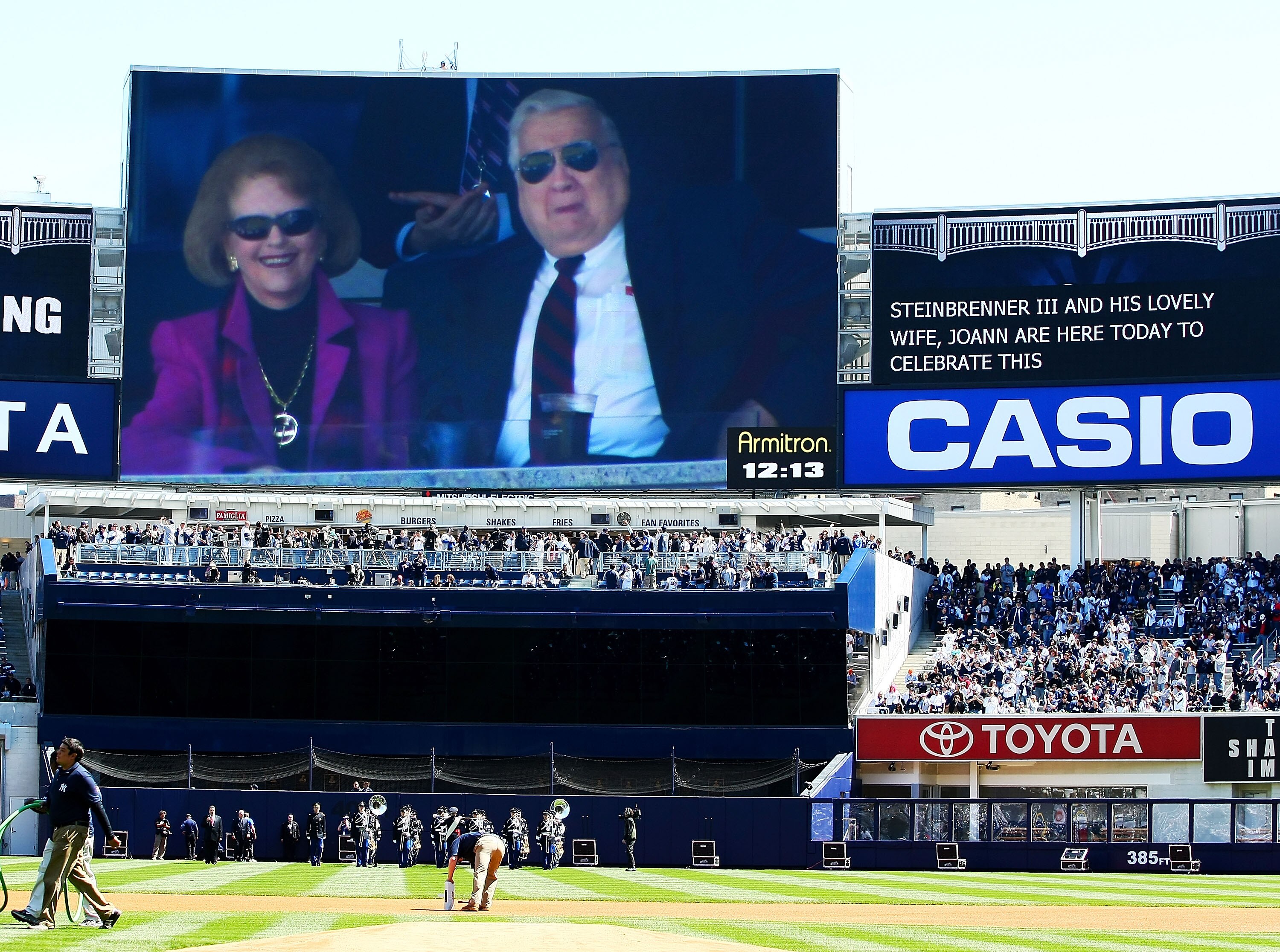 NEW YORK - APRIL 16:  Owner George Steinbrenner (R) is seen on the jumbotron during an opening day ceremony at the new Yankee Stadium on April 16, 2009 in the Bronx borough of New York City. This is the first regular season MLB game being played at the ne