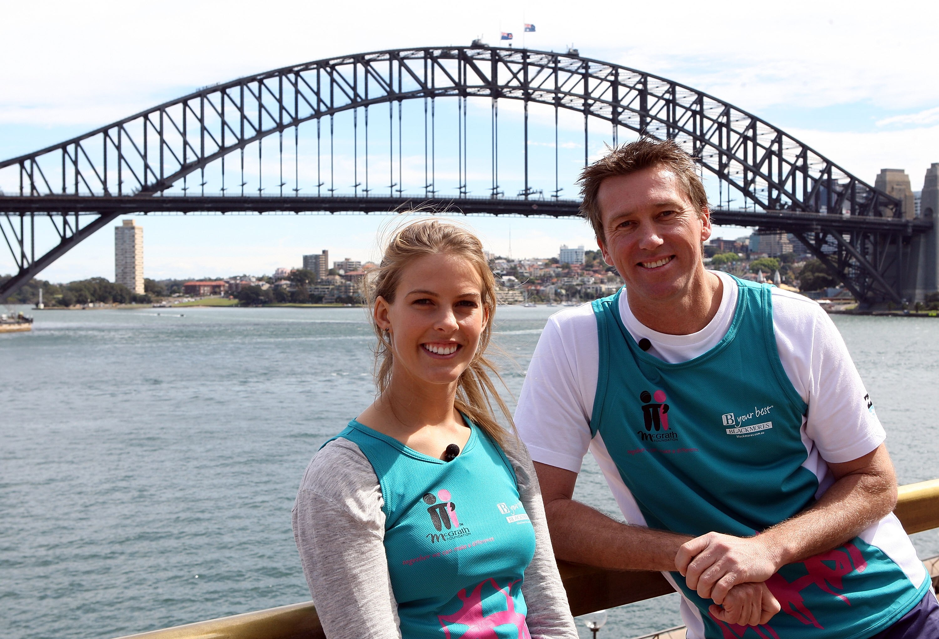 SYDNEY, AUSTRALIA - SEPTEMBER 16:  Australian winter Olympic gold medallist Torah Bright and Glenn McGrath pose during a Sydney Running Festival Press Conference at Sydney Opera House on September 16, 2010 in Sydney, Australia.  (Photo by Mark Metcalfe/Ge