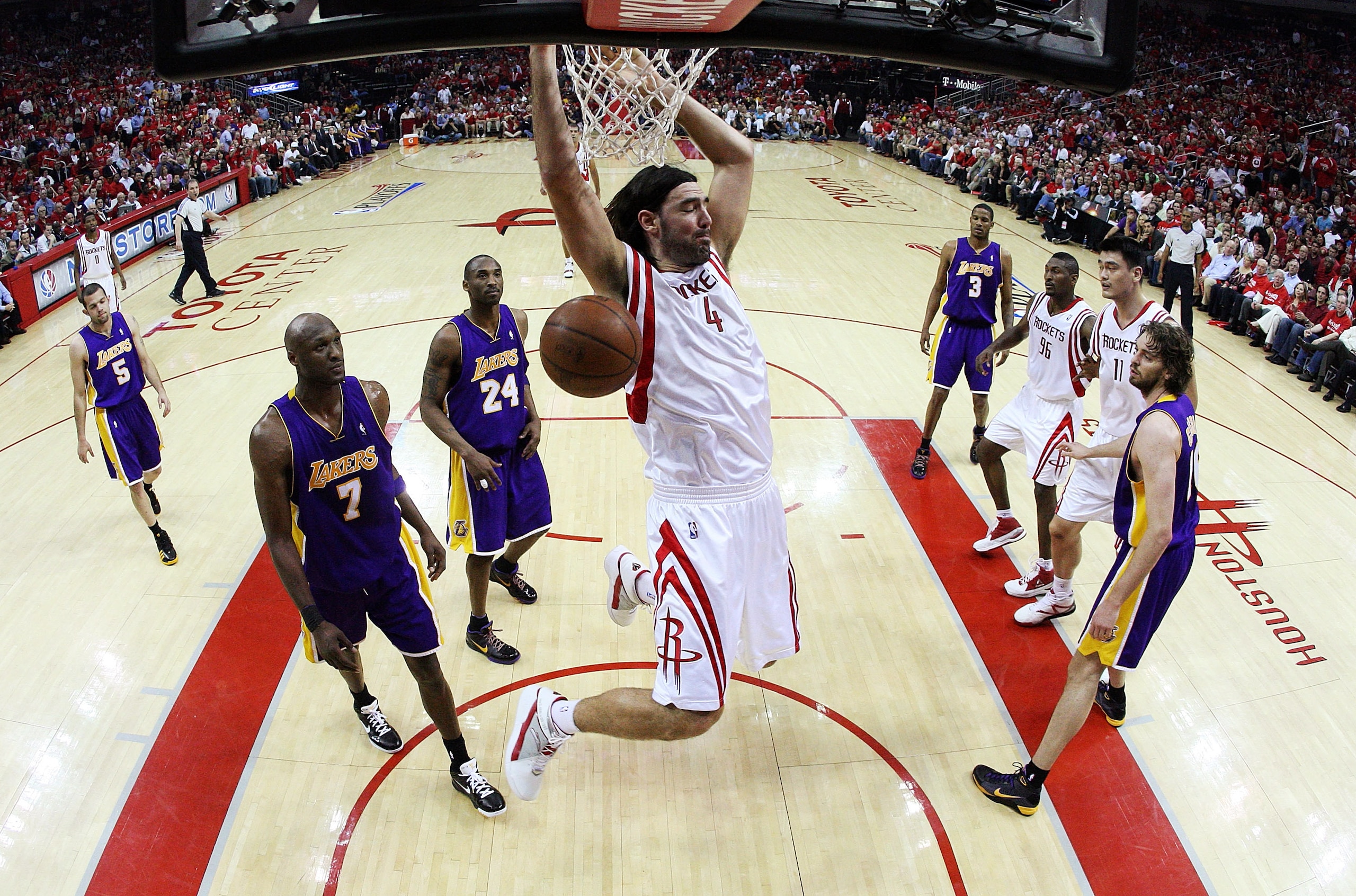 HOUSTON - MAY 08:  Center Luis Scola #4 of the Houston Rockets makes a slam dunk against the Los Angeles Lakers in Game Three of the Western Conference Semifinals during the 2009 NBA Playoffs at Toyota Center on May 8, 2009 in Houston, Texas. NOTE TO USER