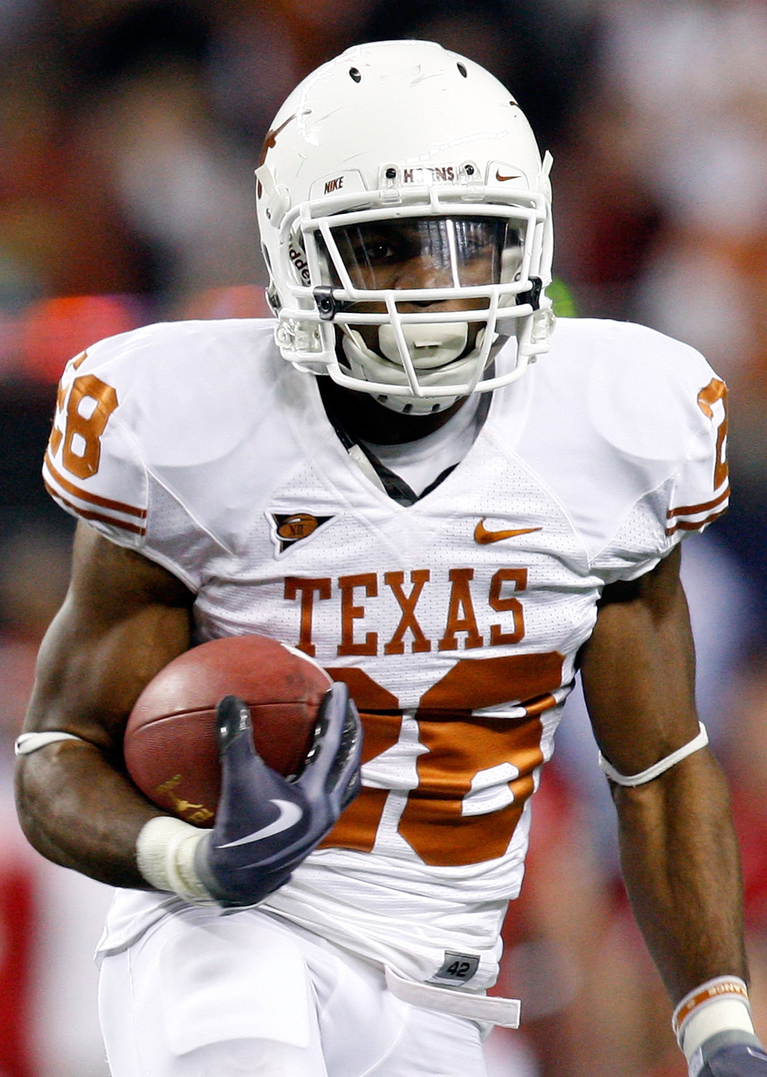 ARLINGTON, TX - DECEMBER 05:  Running back Foswhitt Whittaker #28 of the Texas Longhorns at Cowboys Stadium on December 5, 2009 in Arlington, Texas.  (Photo by Ronald Martinez/Getty Images)
