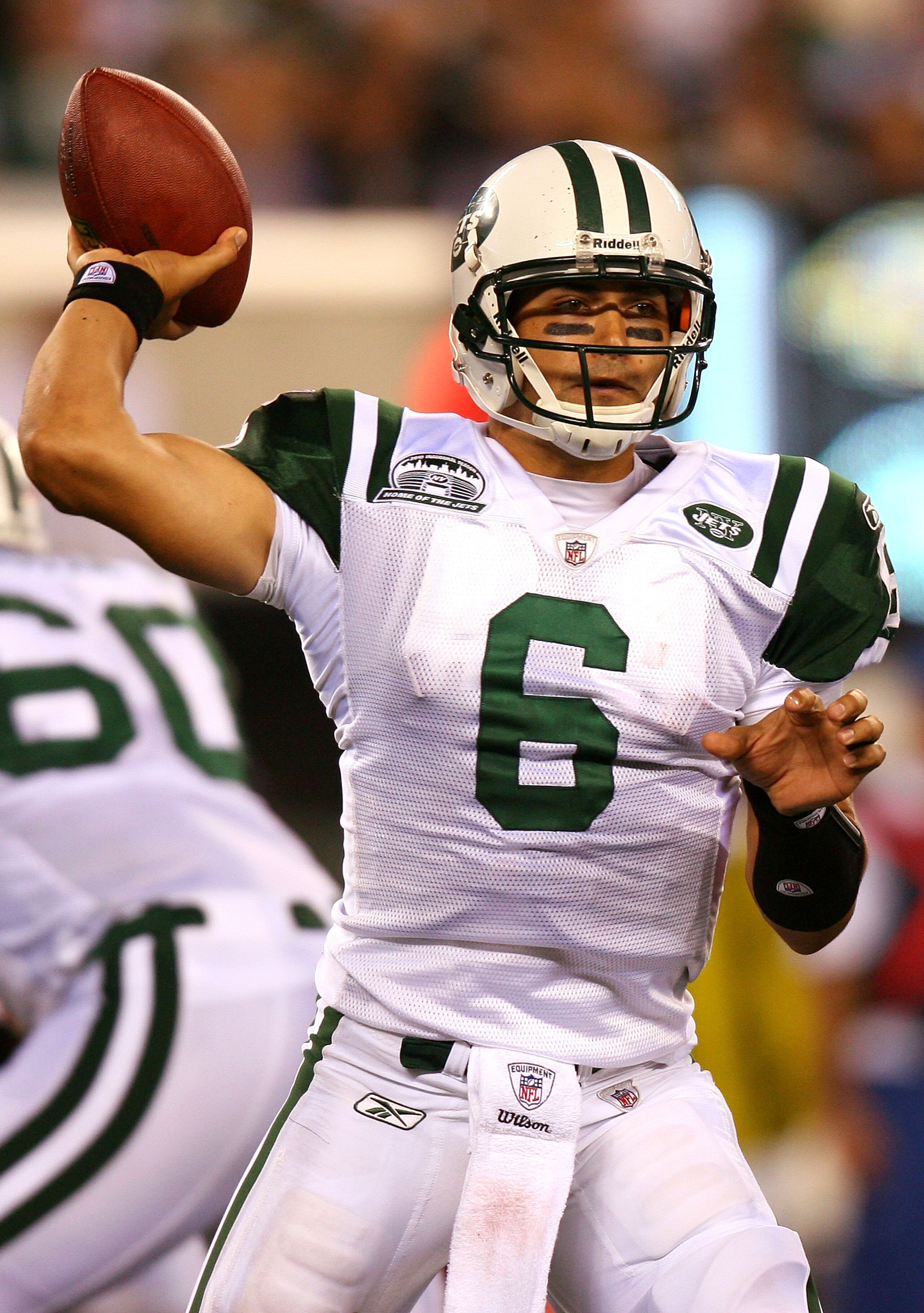 EAST RUTHERFORD, NJ - SEPTEMBER 13:  Mark Sanchez #6 of the New York Jets throws a pass against the Baltimore Ravens during their home opener at the New Meadowlands Stadium on September 13, 2010 in East Rutherford, New Jersey.  (Photo by Andrew Burton/Get