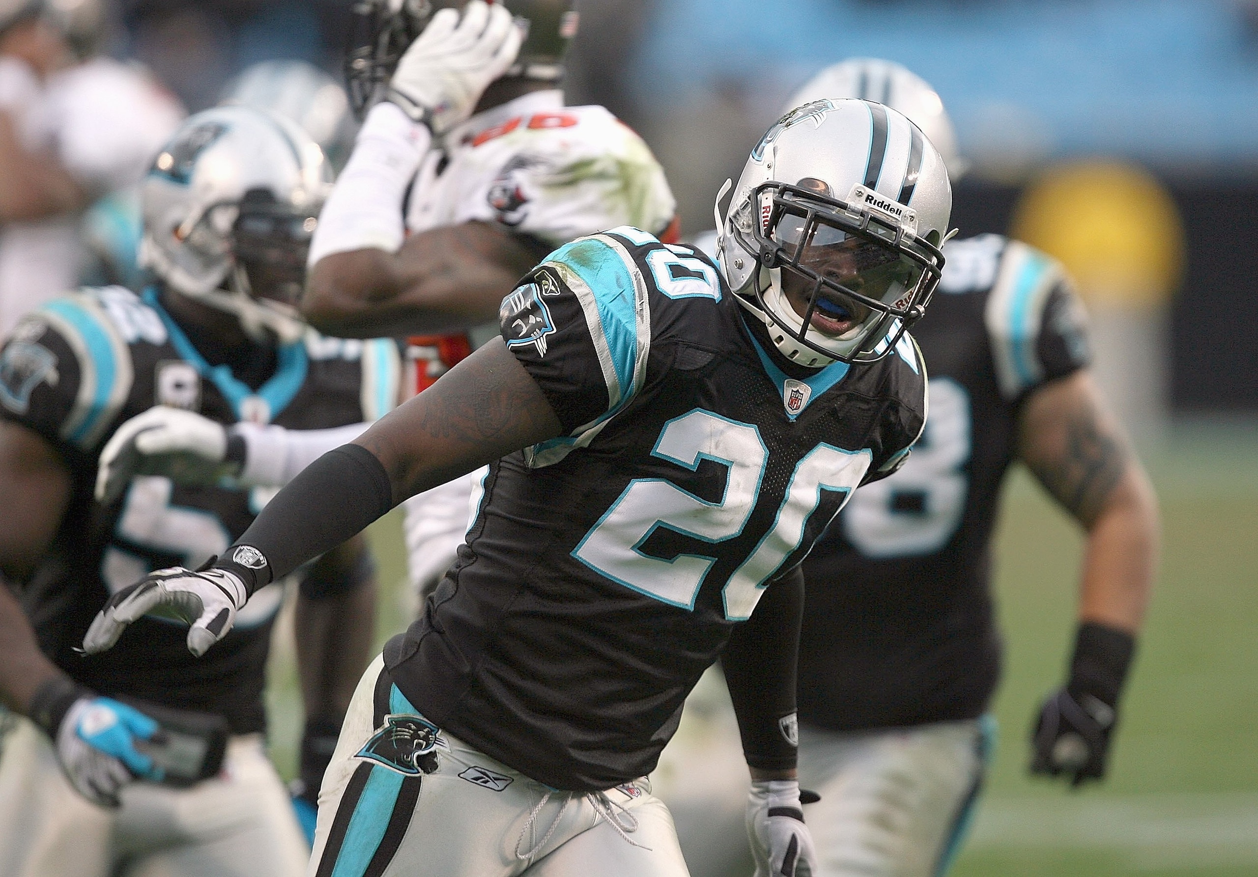 CHARLOTTE, NC - DECEMBER 06:  Chris Gamble #20 of the Carolina Panthers runs on the field during the game against the Tampa Bay Buccaneers at Bank of America Stadium on December 6, 2009 in Charlotte, North Carolina.  (Photo by Streeter Lecka/Getty Images)
