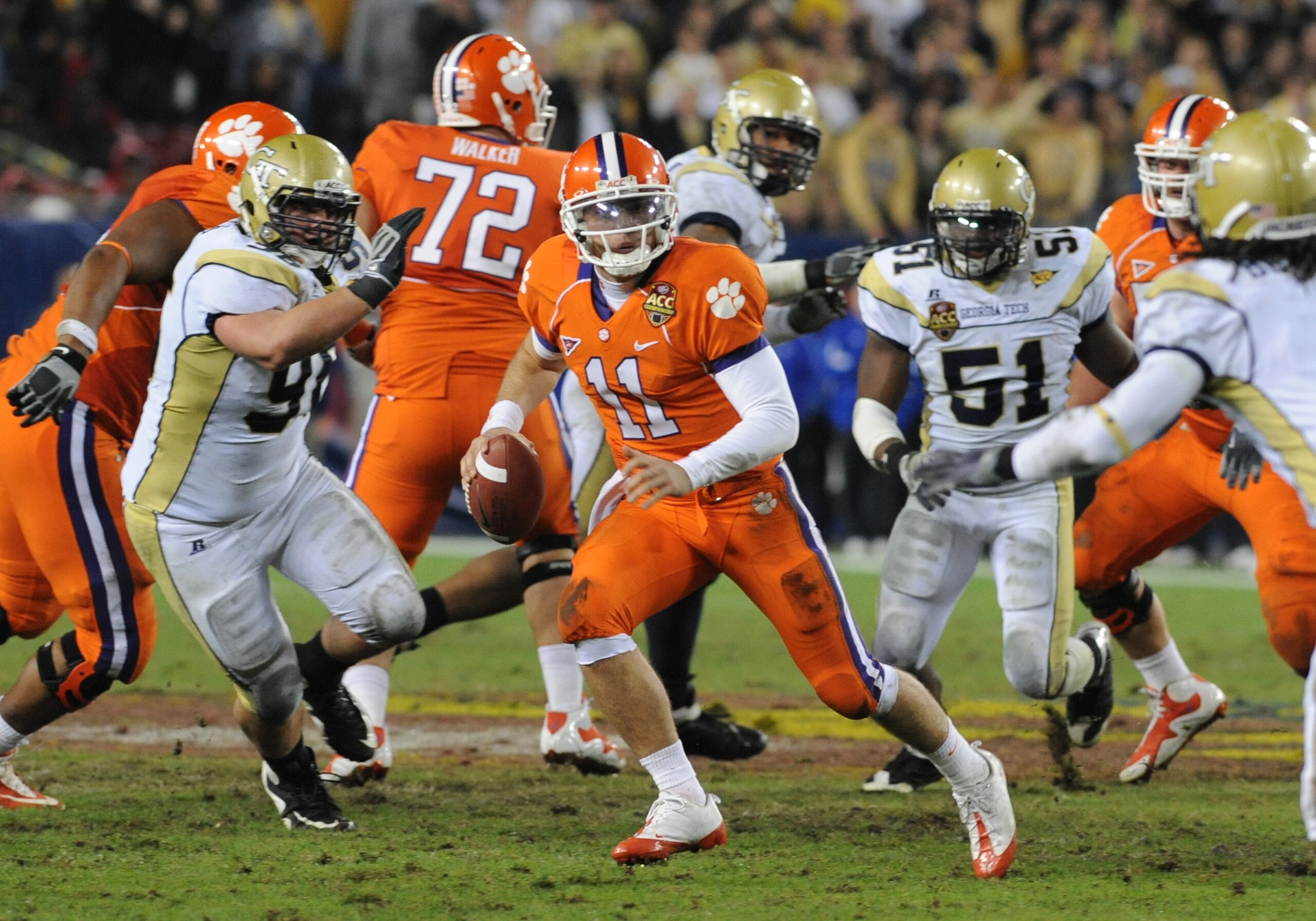 TAMPA, FL - NOVEMBER 28:  Quarterback Kyle Parker #11 of the Clemson Tigers rushes upfield against the Georgia Tech Yellow Jackets in the 2009 ACC Football Championship Game at Raymond James Stadium on December 5, 2009 in Tampa, Florida.  (Photo by Al Mes