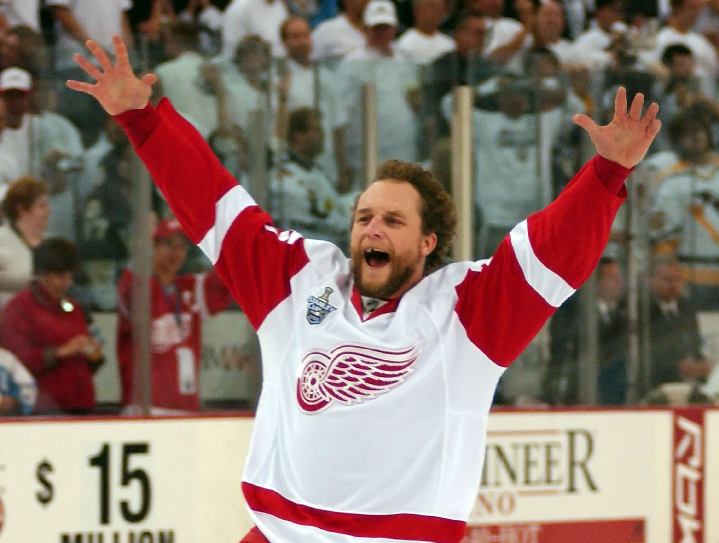 PITTSBURGH - JUNE 04:  Darren McCarty #25 of the Detroit Red Wings celebrates after defeating the Pittsburgh Penguins in game six of the 2008 NHL Stanley Cup Finals at Mellon Arena on June 4, 2008 in Pittsburgh. Pennsylvania. The Red Wings defeated the Pe