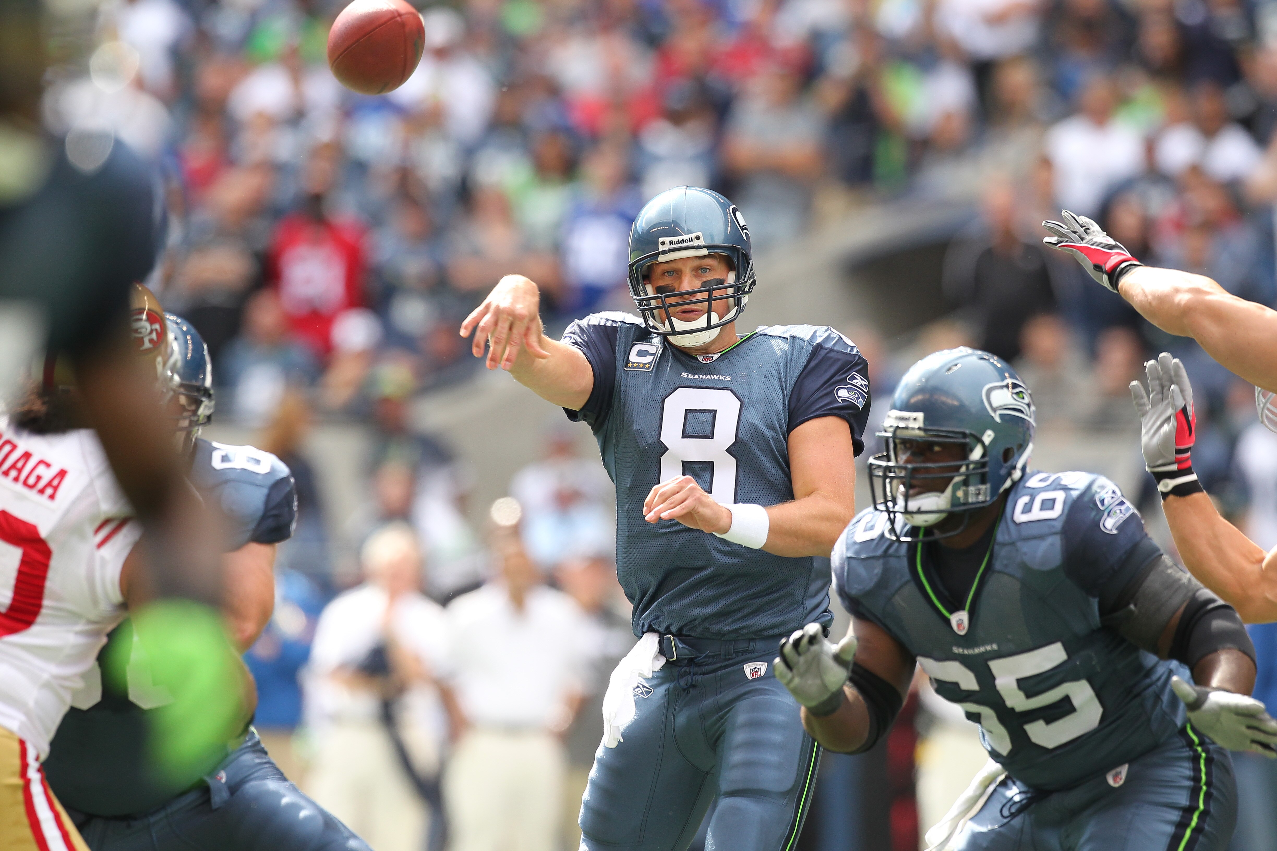 SEATTLE - SEPTEMBER 12:  Quarterback Matt Hasselbeck #8 of the Seattle Seahawks passes during the NFL season opener against the San Francisco 49ers at Qwest Field on September 12, 2010 in Seattle, Washington. (Photo by Otto Greule Jr/Getty Images)