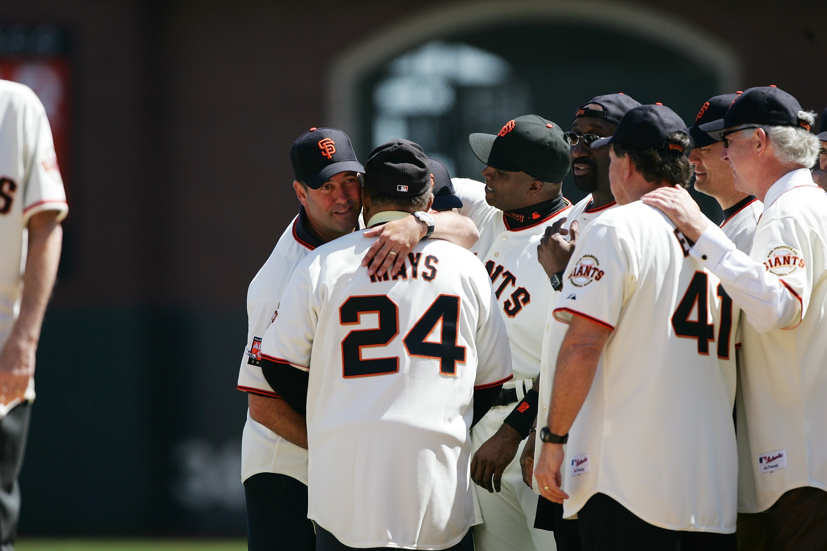 SAN FRANCISCO - APRIL 3:  Former San Francisco Giants player Will Clark greets Willie Mays during a pregame ceremony before the game against the San Diego Padres during Opening Day on April 3, 2007 at AT&T Park in San Francisco, California. The Padres won