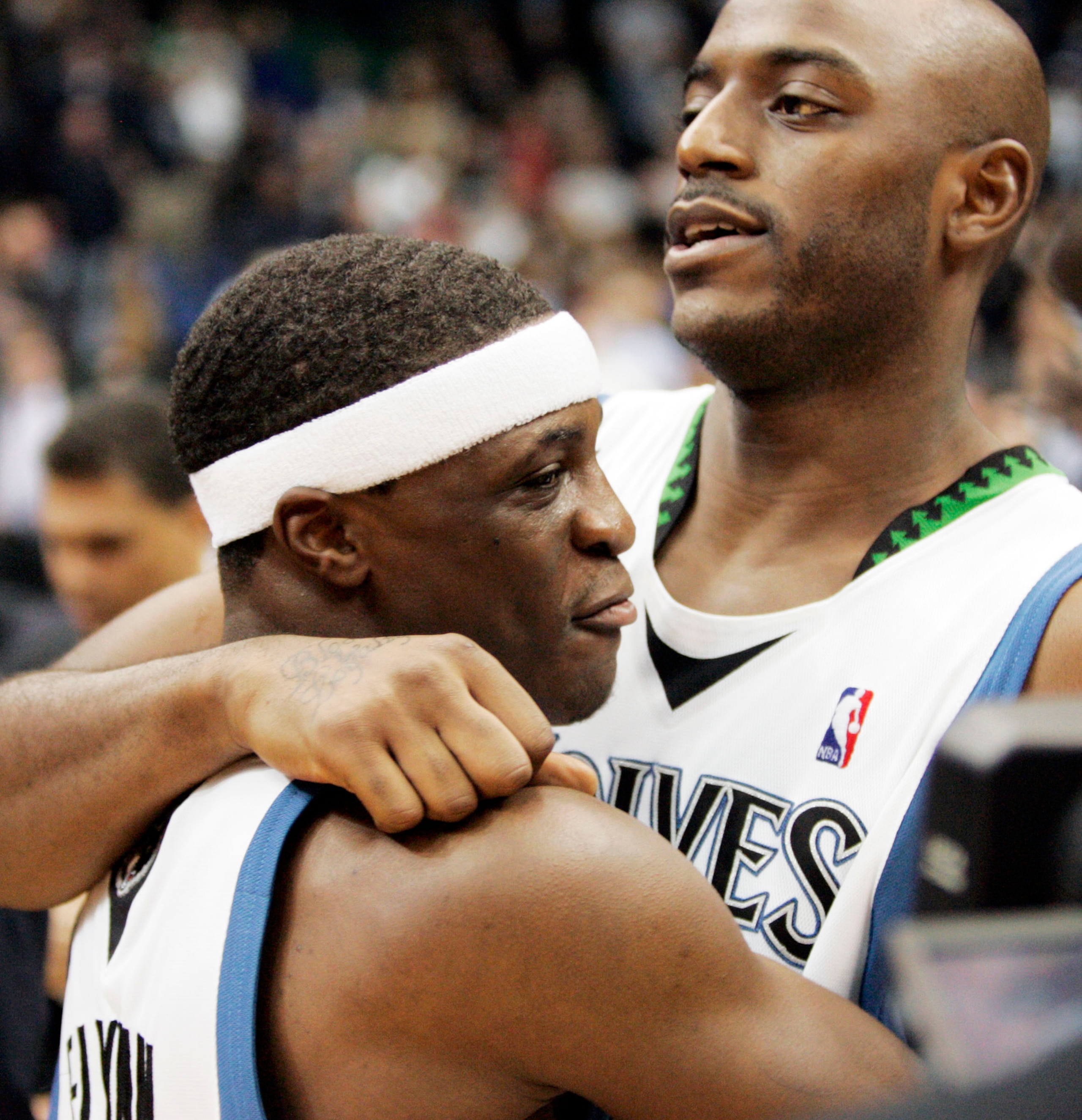 MINNEAPOLIS, MN - OCTOBER 28: Jonny Flynn #10 of the Minnesota Timberwolves celebrates with teammate Damien Wilkins #3 after Wilkins hit the game-winning shot at the buzzer to defeat the New Jersey Nets 95-93 at the Target Center on October 28, 2009 in Mi
