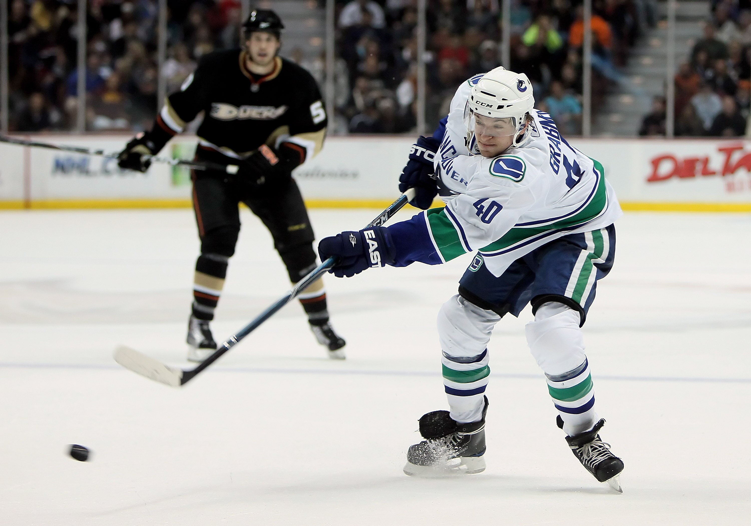 ANAHEIM, CA - APRIL 02:  Michael Grabner #40 of the Vancouver Canucks shoots the puck in the second period against the Anaheim Ducks at the Honda Center on April 2, 2010 in Anaheim, California. The Canucks defeated the Ducks 5-4 in a shootout.  (Photo by