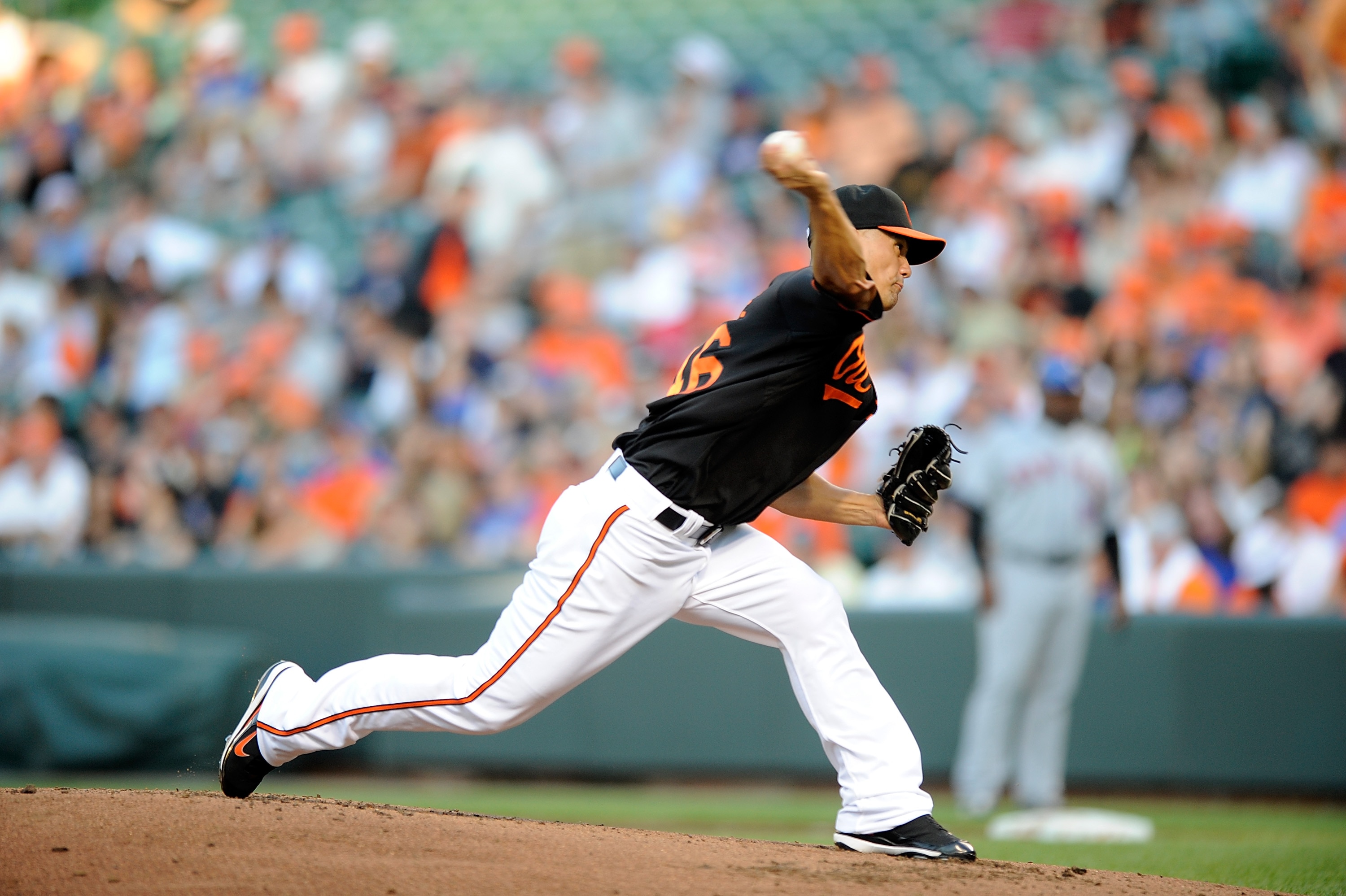 BALTIMORE - JUNE 11:  Jeremy Guthrie #46 of the Baltimore Orioles pitches against the New York Mets at Camden Yards on June 11, 2010 in Baltimore, Maryland.  (Photo by Greg Fiume/Getty Images)